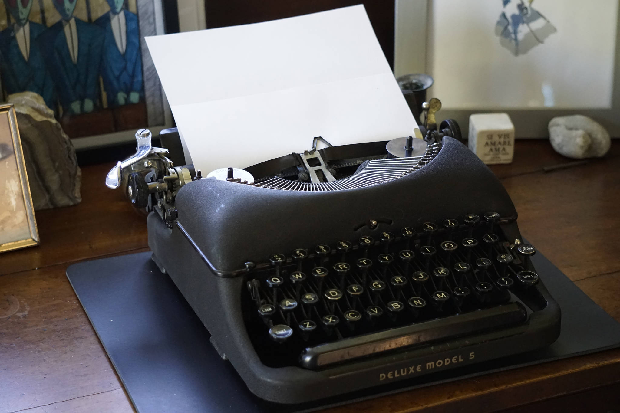A Remington Deluxe Model 5 typewriter sits on a desk on Saturday, June 9, 2018, in Homer, Alaska. (Photo by Michael Armstrong/Homer News)