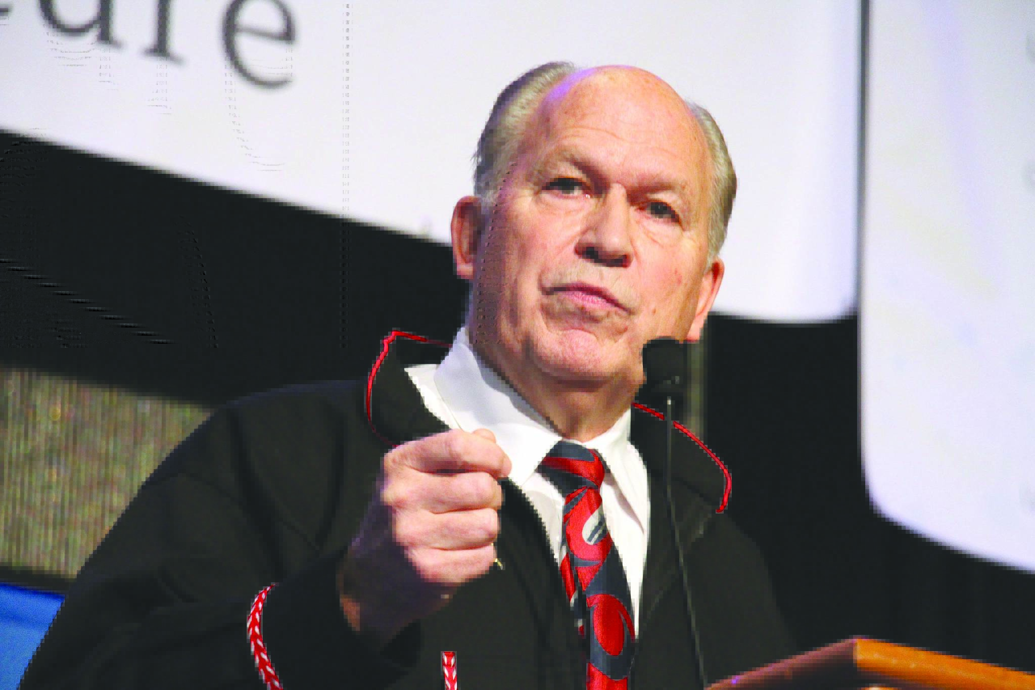 FILE - In this Oct. 18, 2018, file photo, then-Alaska Gov. Bill Walker addresses delegates at the annual Alaska Federation of Natives conference in Anchorage, Alaska. Former Alaska Gov. Walker, who was one of the country’s few politically unaffiliated governors, plans to discuss with students bridging the political divide during an upcoming, on-campus residency at Harvard University. (AP Photo/Mark Thiessen, File)