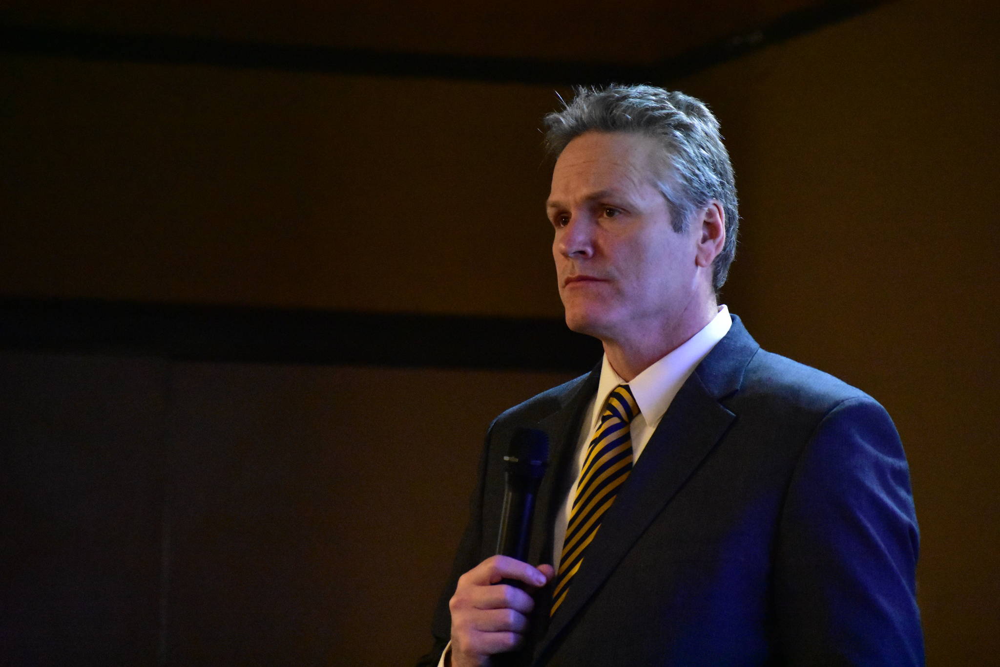 Gov. Mike Dunleavy speaks to local leaders at the Alaska Municipal League’s legislative conference in this February 2020 photo. (Peter Segall/ Juneau Empire File)
