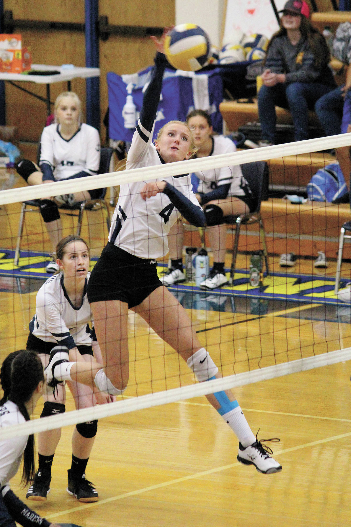 Homer’s Gracie Gummer spikes the ball during a Tuesday, Sept. 22, 2020 volleyball game against Soldotna High School in the Alice Witte Gymnasium in Homer, Alaska. (Photo by Megan Pacer/Homer News)