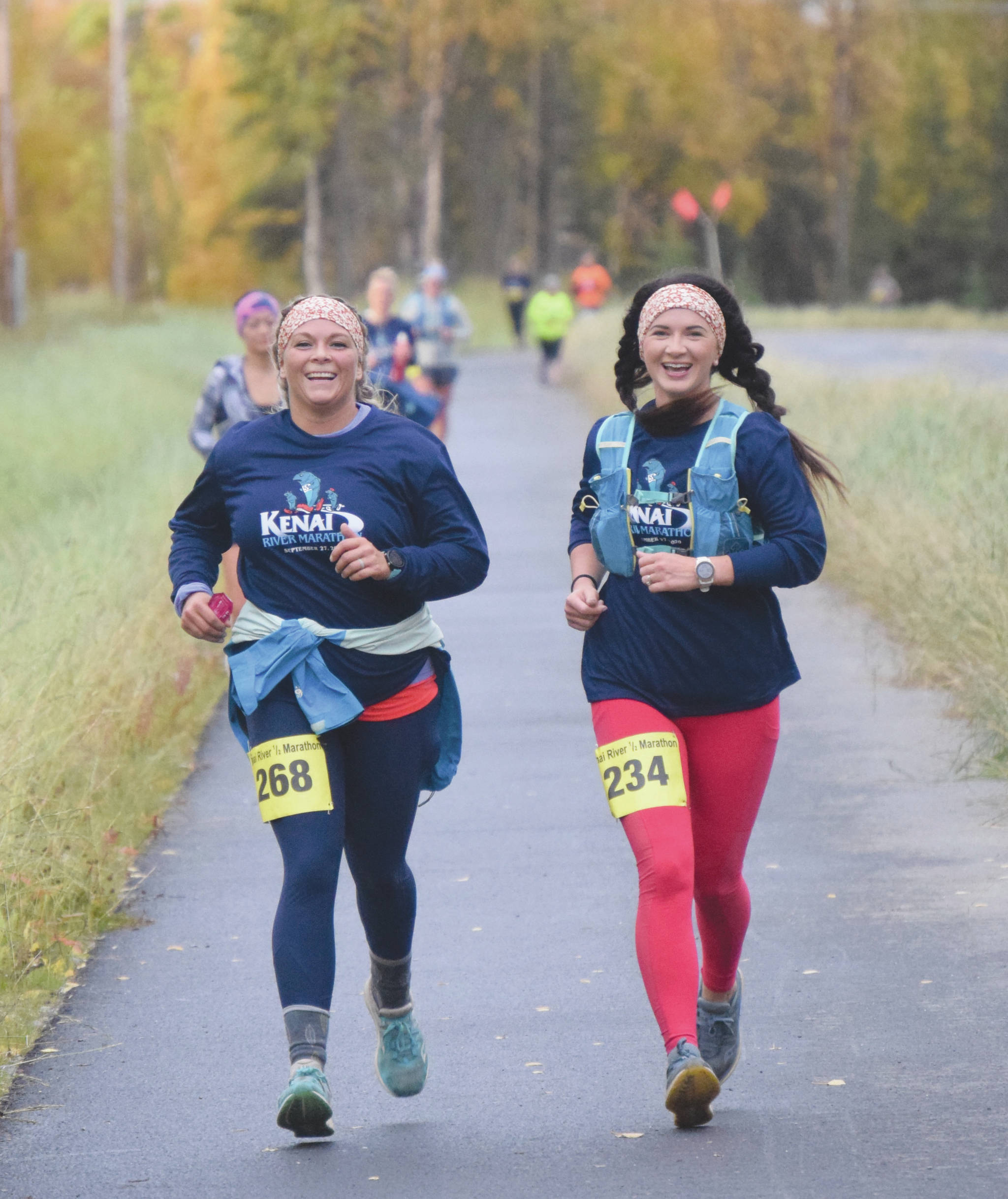 Kenai’s Sarah Pribbenow and Antonya Hall run the half marathon at the Kenai River Marathon on Sunday, Sept. 27, 2020, on Beaver Loop Road in Kenai, Alaska. (Photo by Jeff Helminiak/Peninsula Clarion)