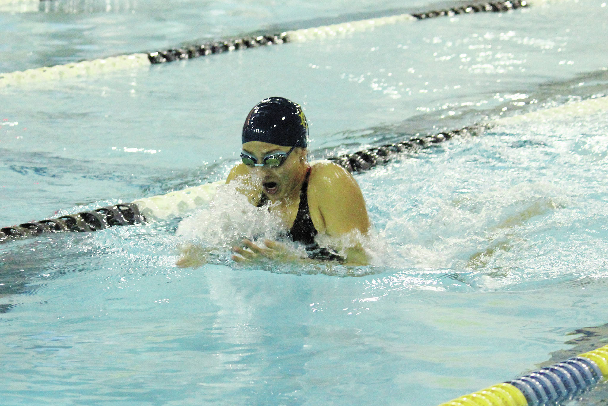 Homer’s Madison Story swims the breaststroke leg of the girls 200 yard medley relay Friday, Oct. 2, 2020 during a dual meet against Seward High School at the Kate Kuhns Aquatic Center in Homer, Alaska. (Photo by Megan Pacer/Homer News)