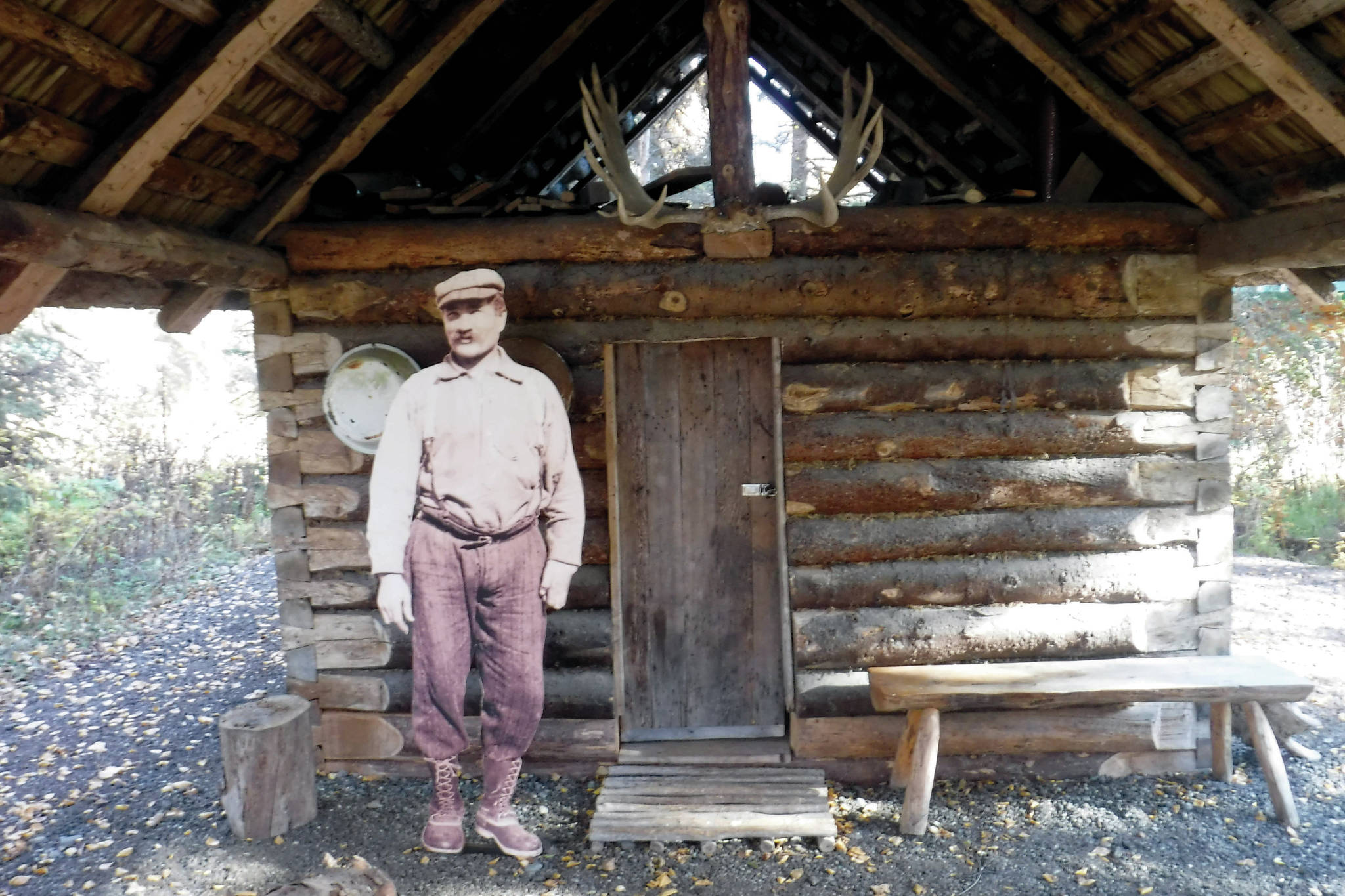 Andrew Berg outside his ҈omesteadӠcabin, which stood originally on Tustumena Lake and now stands at the headquarters of Kenai National Wildlife Refuge. (Photo provided by Kenai National Wildlife Refuge)
