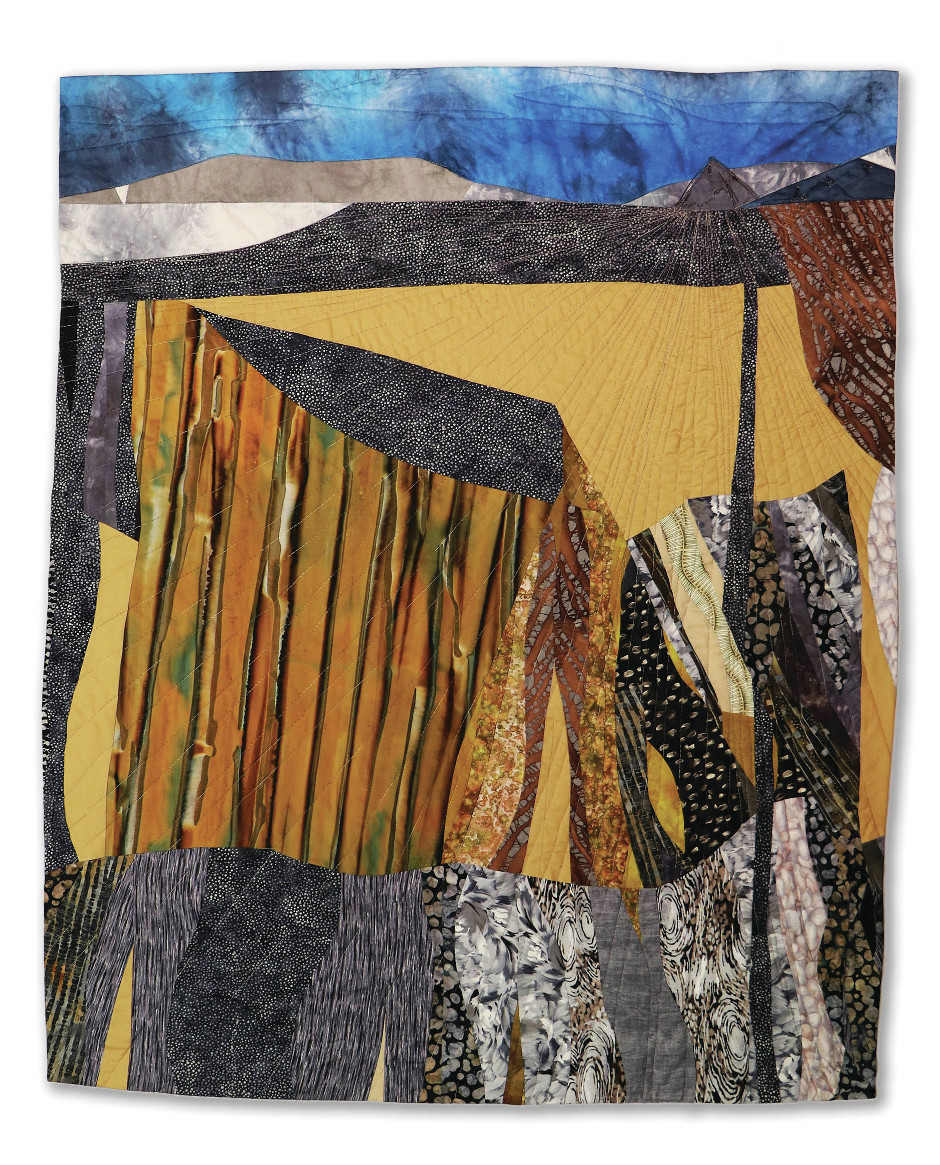 Nan Thompson’s quilt, “Copper River,” one of the 45 art quilts featured in “Shifting Tides: Cloth in Convergence,” on exhibit from Oct. 9 to Nov. 28, 2020, at the Pratt Museum in Homer, Alaska. (Photo by K.P. Schaefermeyer)
