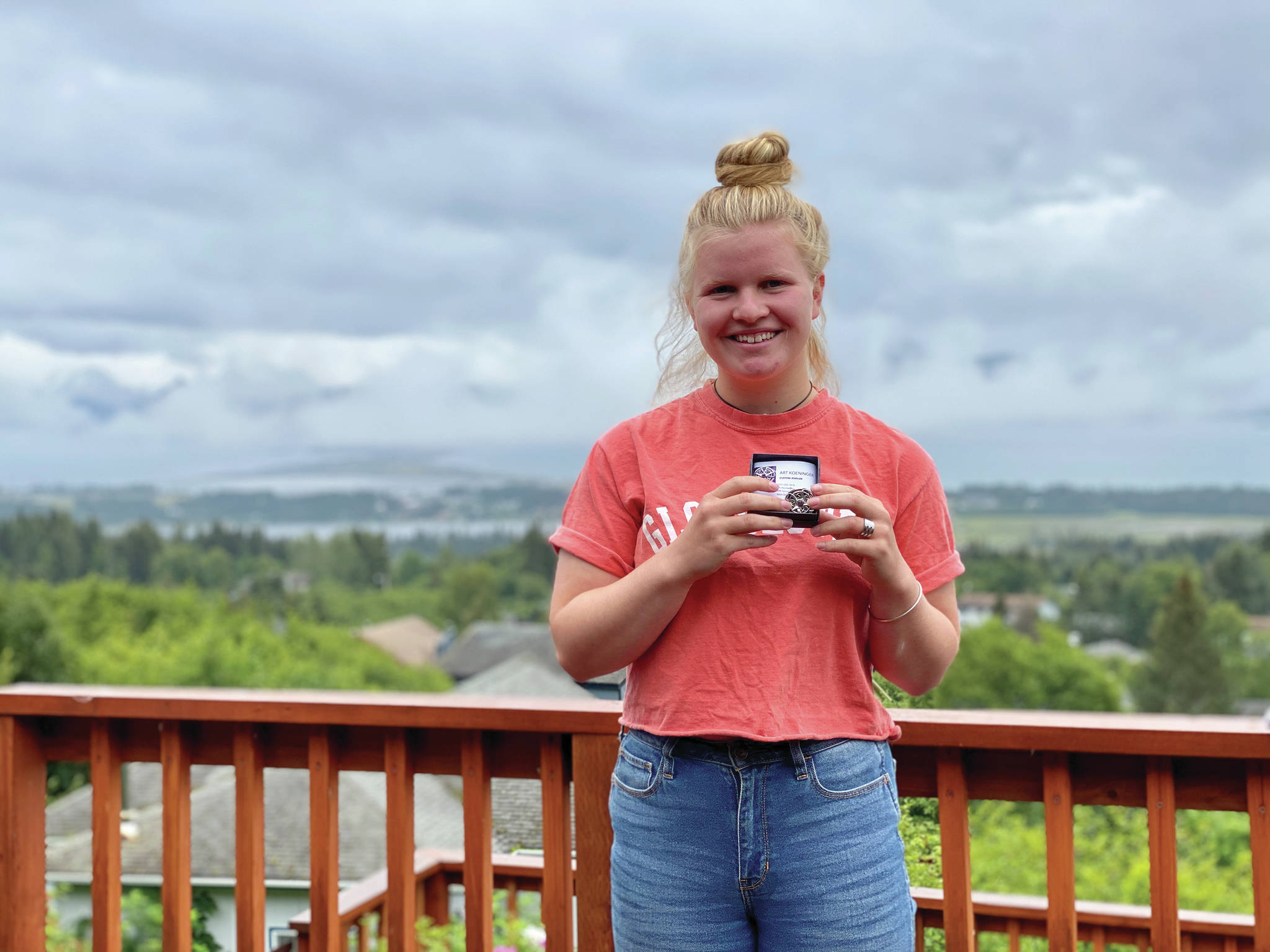 Young Woman of Distinction Daisy Kettle holds her award from South Peninsula Haven House in this photo taken July 25, 2020, in Homer, Alaska. (Photo courtesy South Peninsula Haven House)