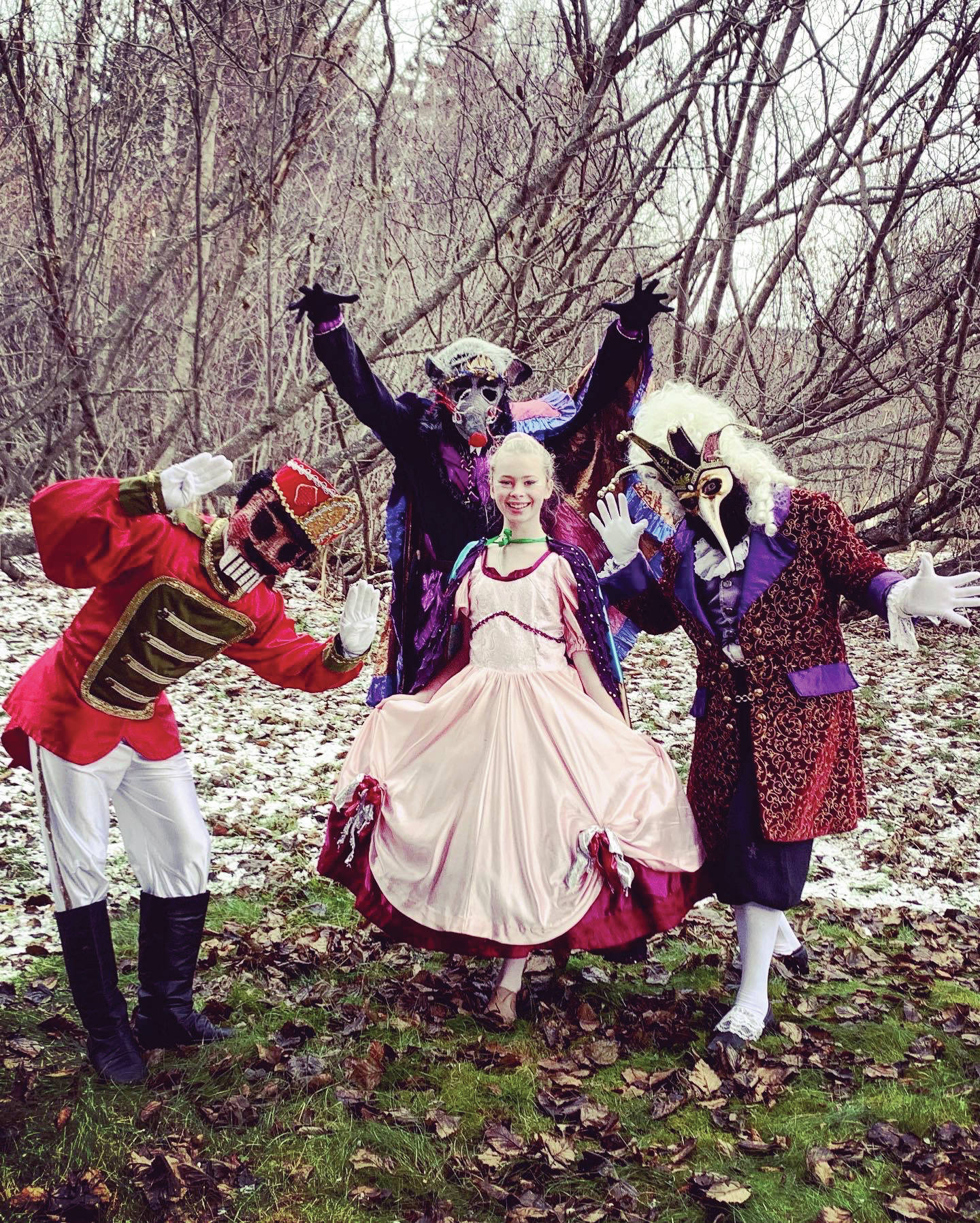 From left to right, Bryson Brewer-Dell as the Nutcracker, Liam James as the Rat King, Swift Blackstock as Clara and Aaron Walbrecher as Drosselmeyer pose for a photo on Nov. 30, 2020, for the “Petite Nutcracker Ballet” at the Carl Wynn Nature Center in Homer, Alaska. (Photo courtesy Homer Nutcracker Production)