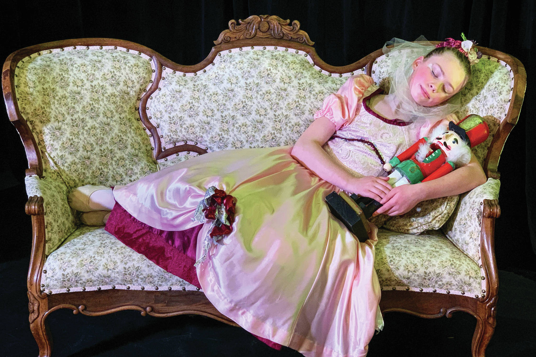 Swift Blackstock as Young Clara poses for a photo on Dec. 3, 2020 in the Petit Nutcracker Ballet at the Homer Nutcracker Productions' black box theater in the Wildberry Building in Homer, Alaska. (Photo by Jennifer Norton)