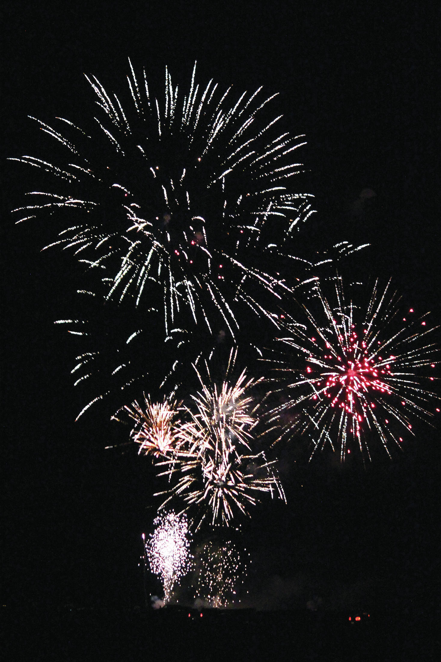 Fireworks explode above the Homer Spit on Dec. 31, 2020 as part of the third annual crowdfunded fireworks in Homer, Alaska. (Photo by Megan Pacer/Homer News)