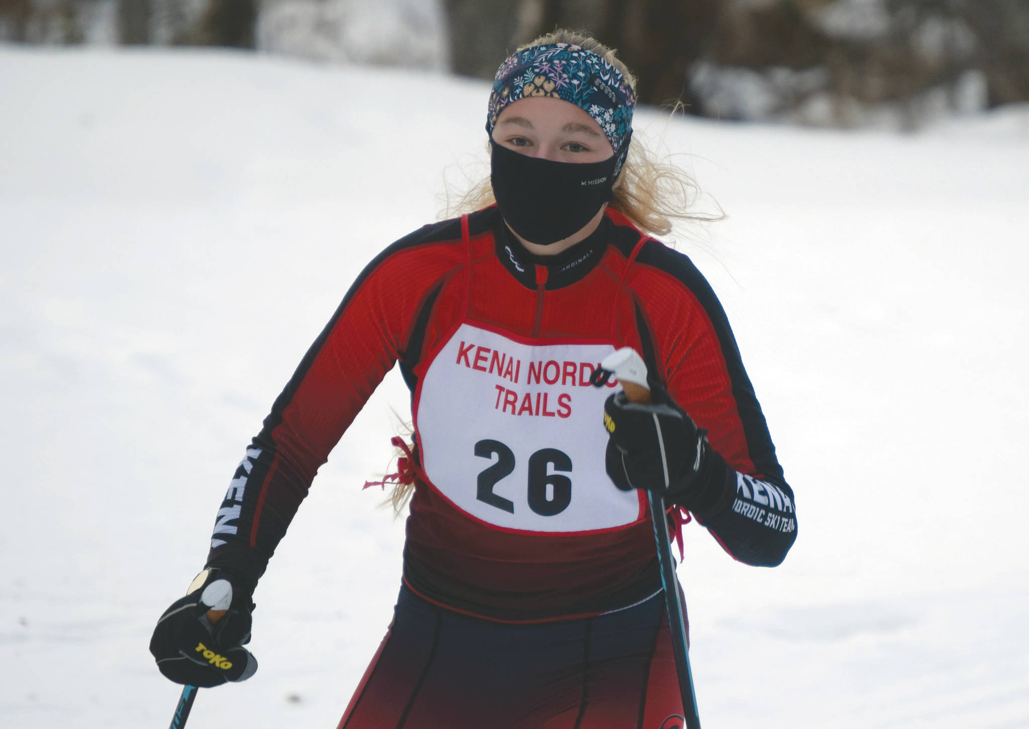 Kenai Central’s Emily Moss takes the victory in the girls race at the Kenai Nordic Trails on Saturday, Jan. 16, 2021, at Kenai Golf Course. (Photo by Jeff Helminiak)