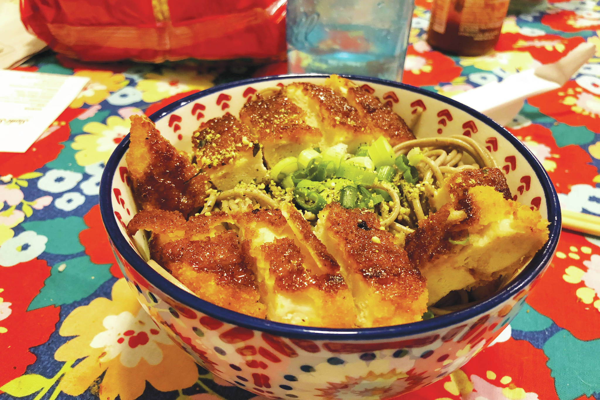 A chicken patty adds to a simple Japanese-cuisine-inspired noodle bowl, Jan. 15, 2021, in Anchorage, Alaska. (Photo by Victoria Petersen/Peninsula Clarion)