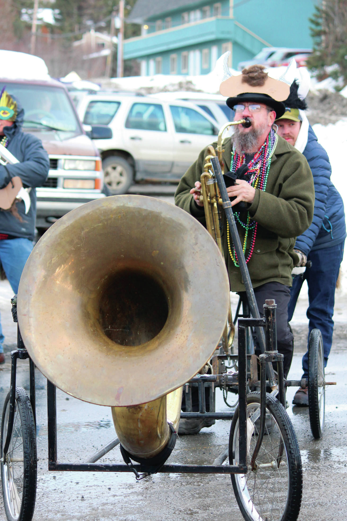 Photo by Megan Pacer/Homer News 
A parade participant plays a bike horn with the Krewe of Gambrinus float during this year’s Homer Winter Carnival Parade on Saturday, Feb. 8, 2020 in Homer, Alaska.