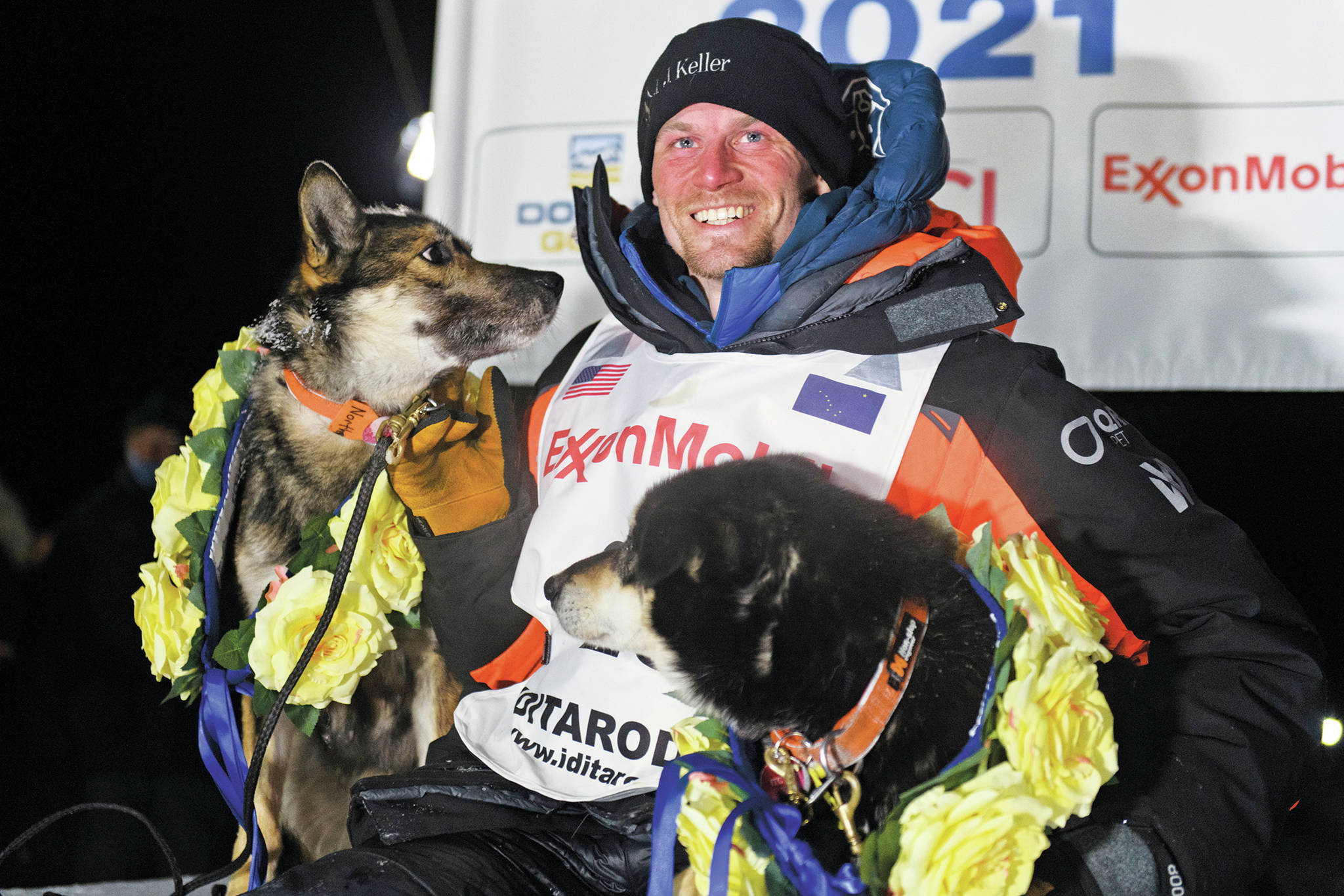 Dallas Seavey poses with his dogs after winning the Iditarod Trail Sled Dog Race race near Willow, Alaska, early Monday, March 15, 2021. (Marc Lester/Anchorage Daily News via AP)