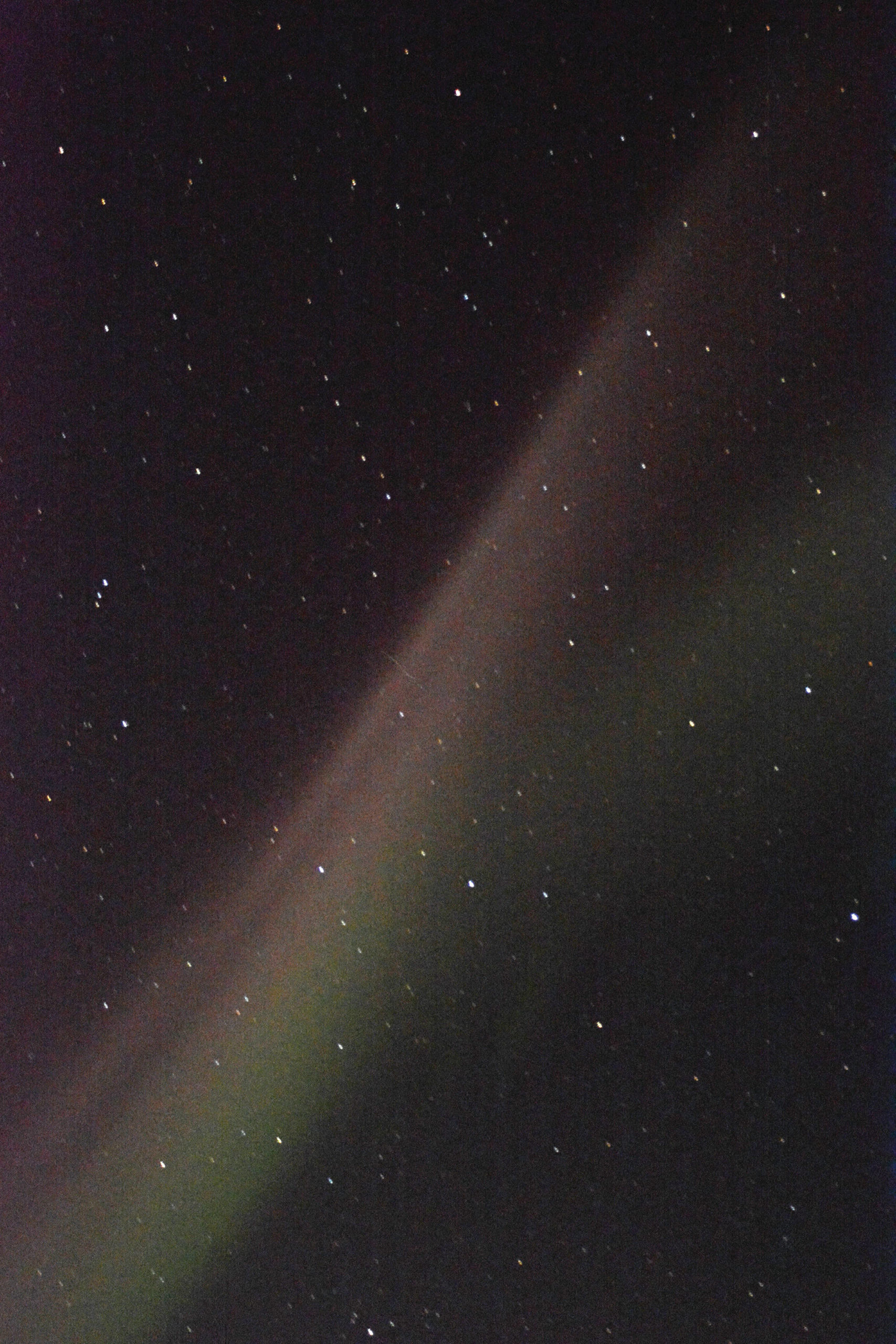 An atmospheric phenomena called STEVE — for “Sudden Thermal Emission from Velocity Enhancement” — is seen in the southern sky early on Saturday, April 17, 2021, from Diamond Ridge near Homer, Alaska. The STEVE appeared the same night as a strong display of auroras to the north. Don Hampton, a research associate and faculty member at the University of Alaska Fairbanks Geophysical Institute, said STEVEs are not auroras, but a stream of charged particles or sub-aurora polarization streams. “It’s actually primarily a different phenomena or mechanism that is creating light,” Hampton said of STEVEs. A STEVE is more of a broadband emission than an aurora and can be distinguished by its color of light. Auroras tend to be green or vivid red, while a STEVE appears white to the human eye and may have tinges of red. Hampton said scientists knew about streams of charged particles that are not auroras, but hadn’t thought to look if there’s an optical phenomena associated with. Aurora chasers in Canada first noticed the optical phenomena in 2014, and it was named by Chris Ratzlaff as a joke reference to the film “Over the Hedge,” where the animals called the hedge “Steve.” NASA scientist Elizabeth Macdonald came up with the description. “It’s pretty cool,” Hampton said. “The whole history of the STEVE is that it’s a citizen scientist discovery.” (Photo by Michael Armstrong/Homer News)
