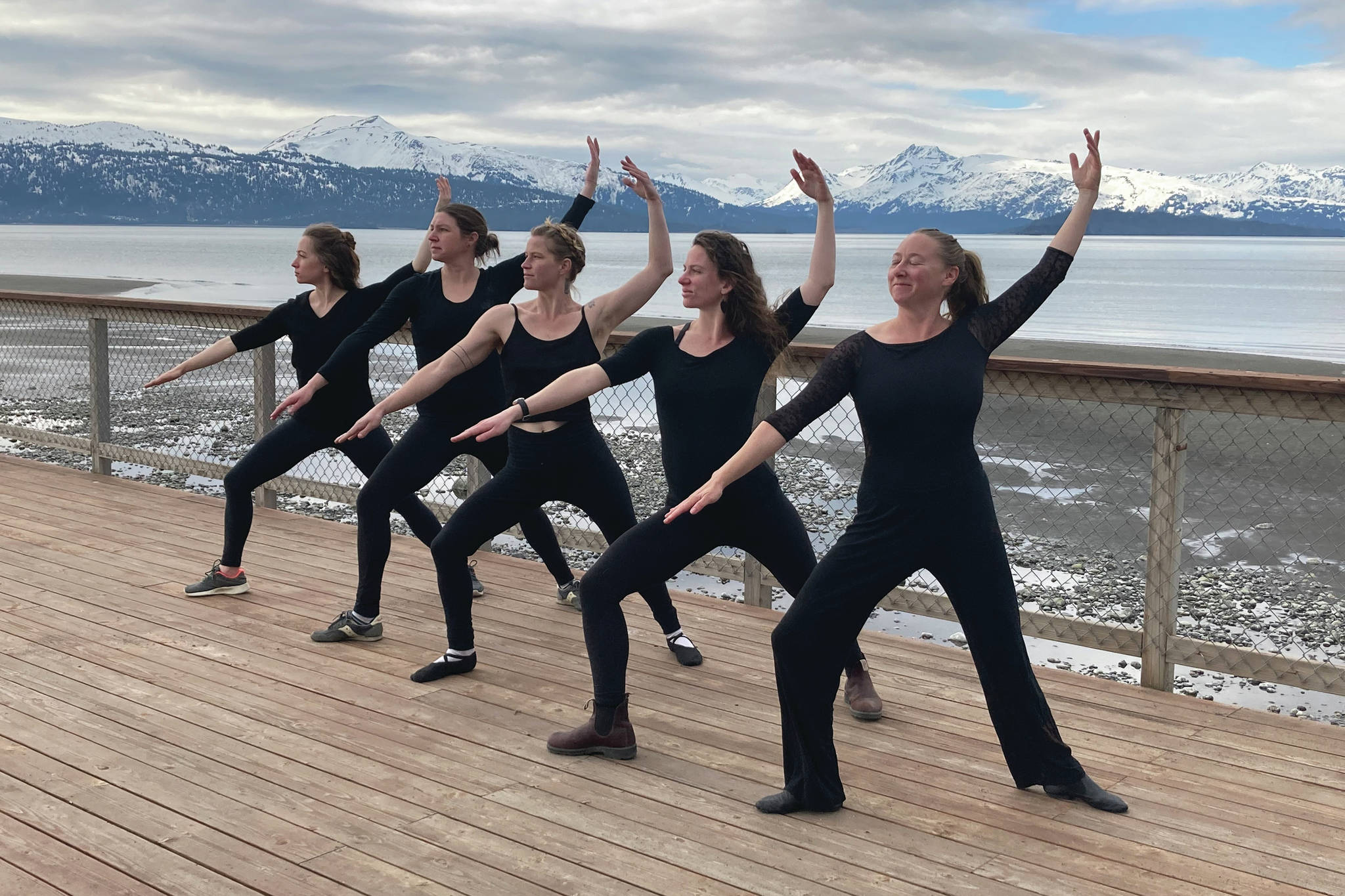 Members of the Motivity Dance Collective rehearse at the Kachemak Shellfish Growers Association deck in Homer, Alaska. From left to right, Emily Rogers, Emilie Springer, Bridget Doran, Rhoslyn Anderson, Breezy Berryman. Not pictured is Kammi Matson. (Photo by Kammi Matson)