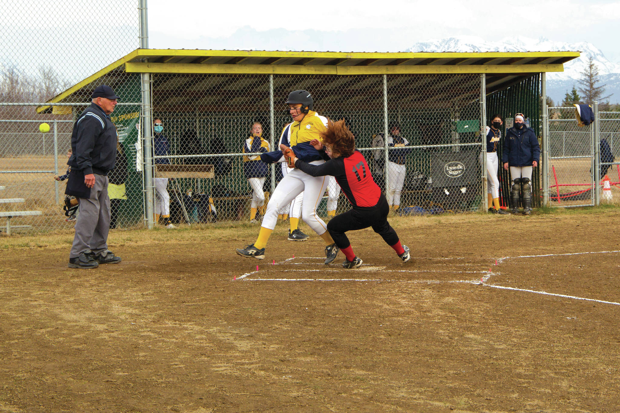 Mariners’ Haylee Owen steals home against the Kenai Kardinals during the home softball game May 4; 2021, at Jack Gist Park. (Photo by Sarah Knapp/Homer News)