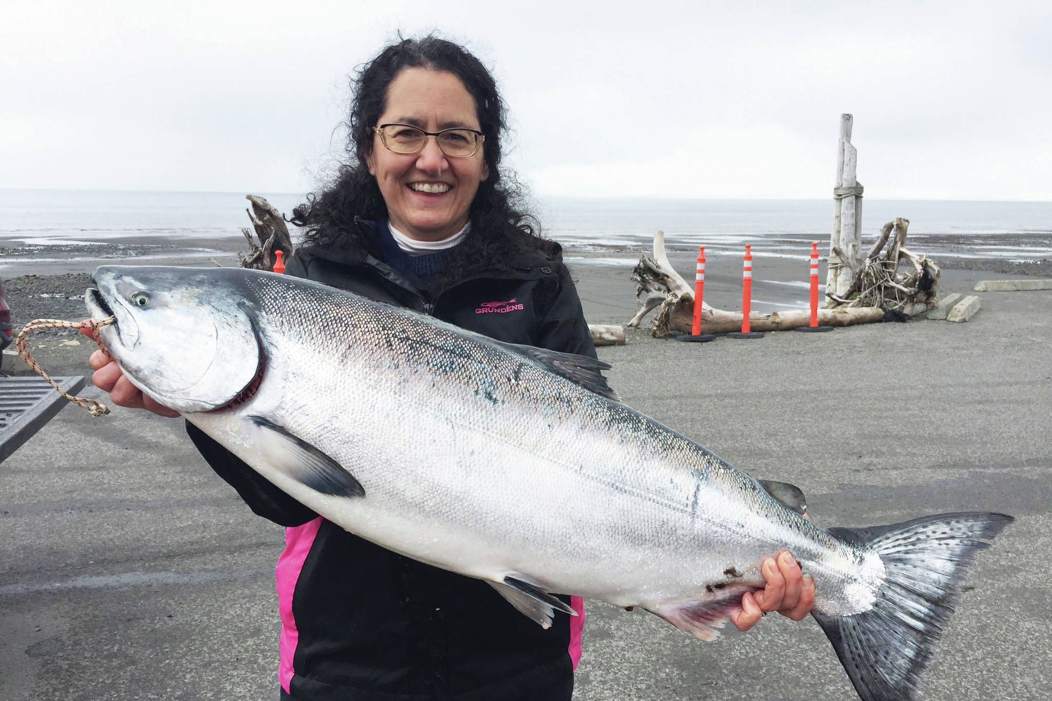 Derotha Ferraro from the fishing vessel Big Game poses with the king salmon she caught at the Anchor Point King Salmon Calcutta on Sunday, May 12, 2019, in Anchor Point, Alaska. Ferraro’s fish was one of the top ten fish caught in the tournament, weighing more than 20 pounds. (Photo courtesy of Bill Scott)