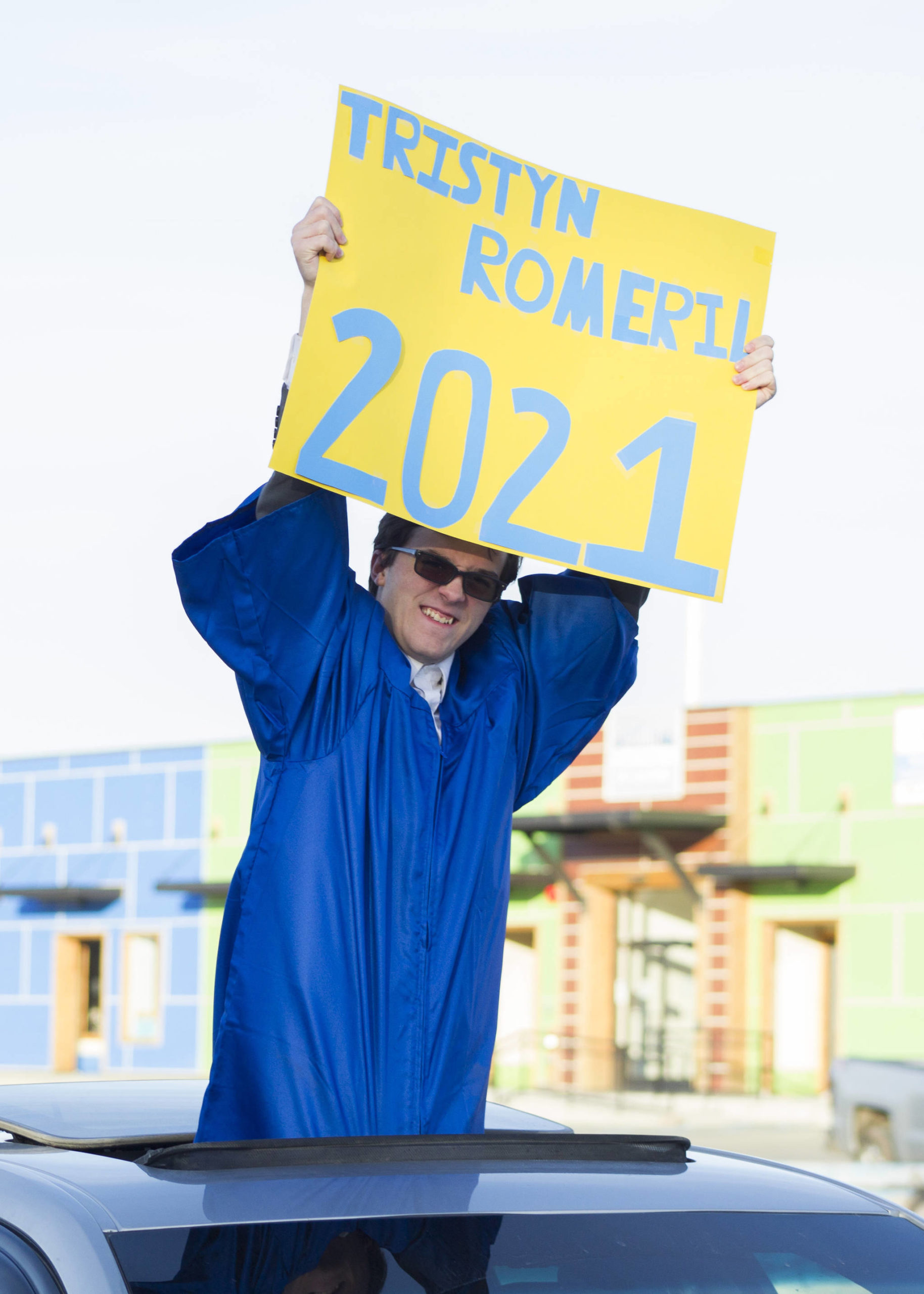 Tristyn Romeril celebrates his graduation from Homer High School on May 18 during the senior parade through Homer. (Photo by Sarah Knapp/Homer News)