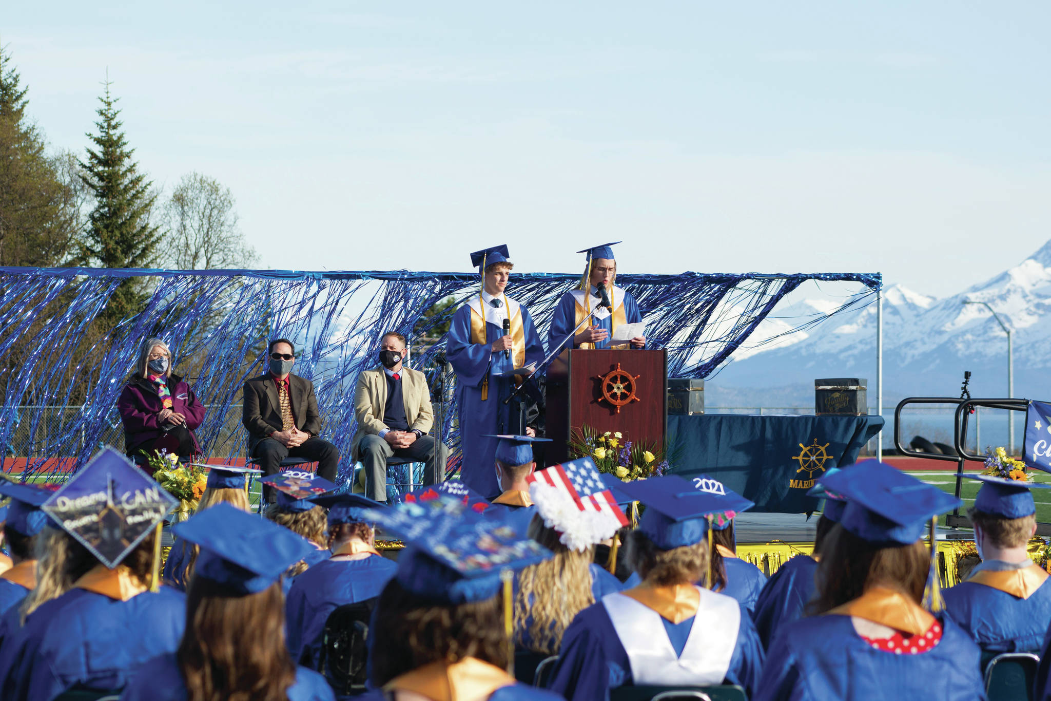 Homer High School valedictorians Austin Cline and Lawrence Dunn challenge their fellow graduates to accept others’ differences and stand up for what is right during graduation May 18. (Photo by Sarah Knapp/Homer News)