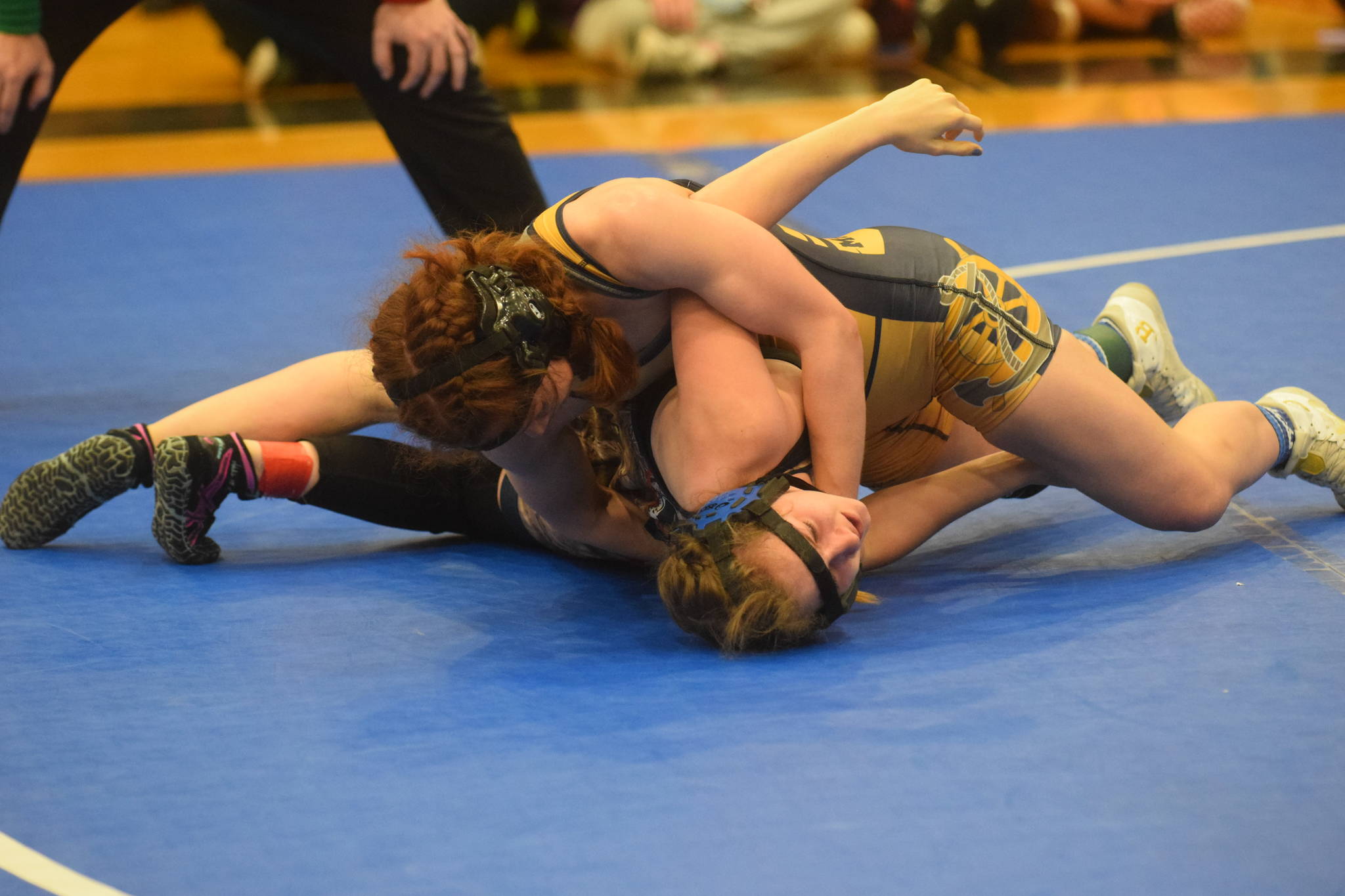 Homer High School sophomore Aileen Lester wrestles in the state championship in Chugiak, Alaska on Saturday, May 22, 2021. (Camille Botello / Peninsula Clarion)