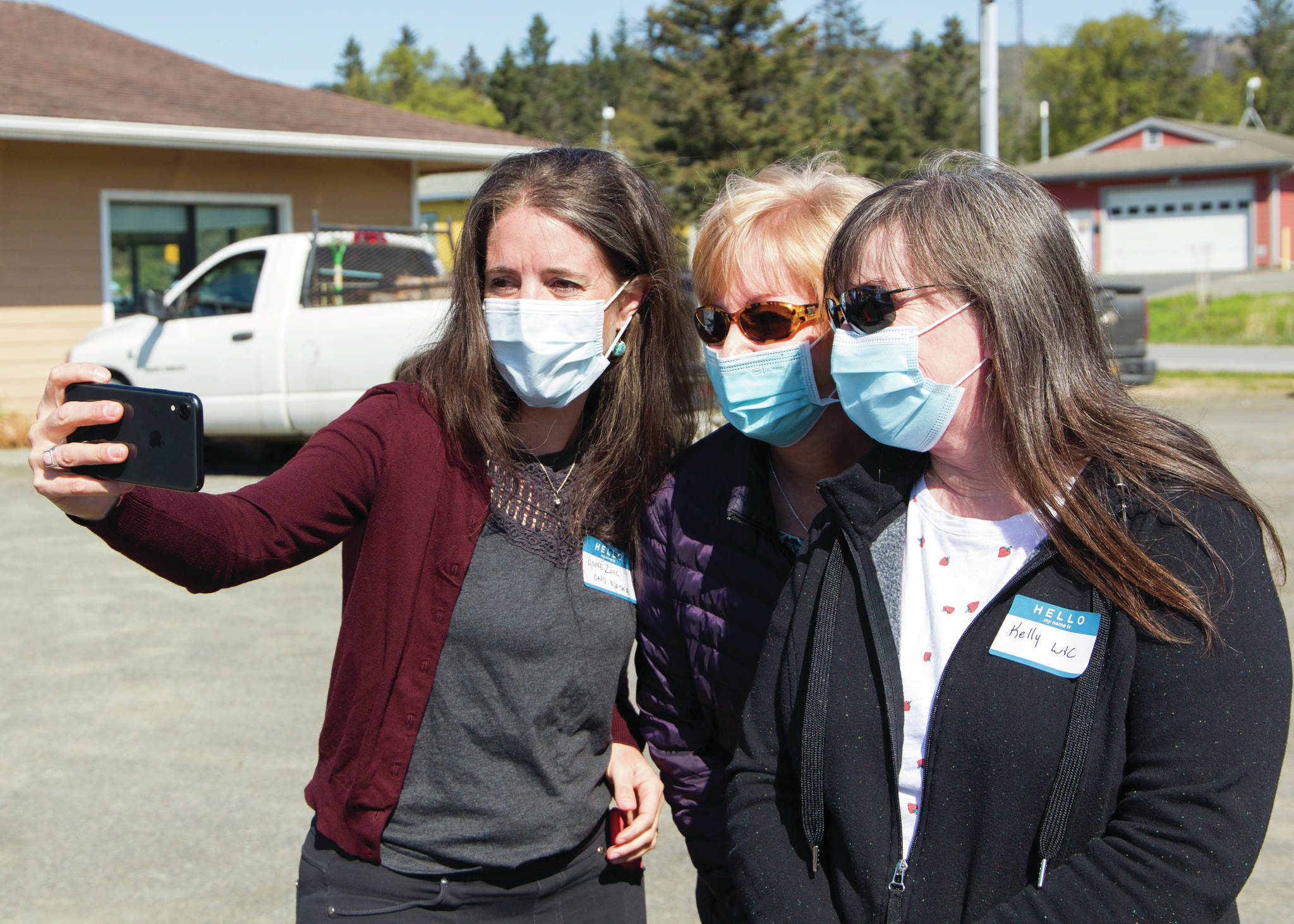 Photo by Sarah Knapp/Homer News
Alaska Chief Medical Officer Anne Zink, M.D., left, poses for a selfie with Kelly Bolt, right, and Debbie Gardner, center, who work at WIC, at a meet-and-greet on Thursday, May 27, 2021, at the Homer Public Health Center in Homer, Alaska.