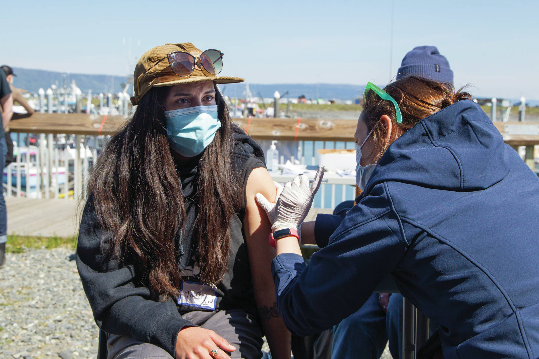 Tara Palacios receives her second COVID-19 vaccine during the pop-up clinic on the Spit May 27. (Photo by Sarah Knapp/Homer News)