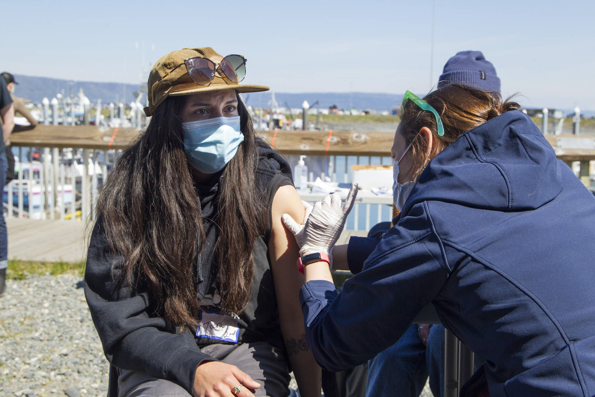 Tara Palacios receives her second COVID-19 vaccine during the pop-up clinic on the Spit May 27. (Photo by Sarah Knapp/Homer News)