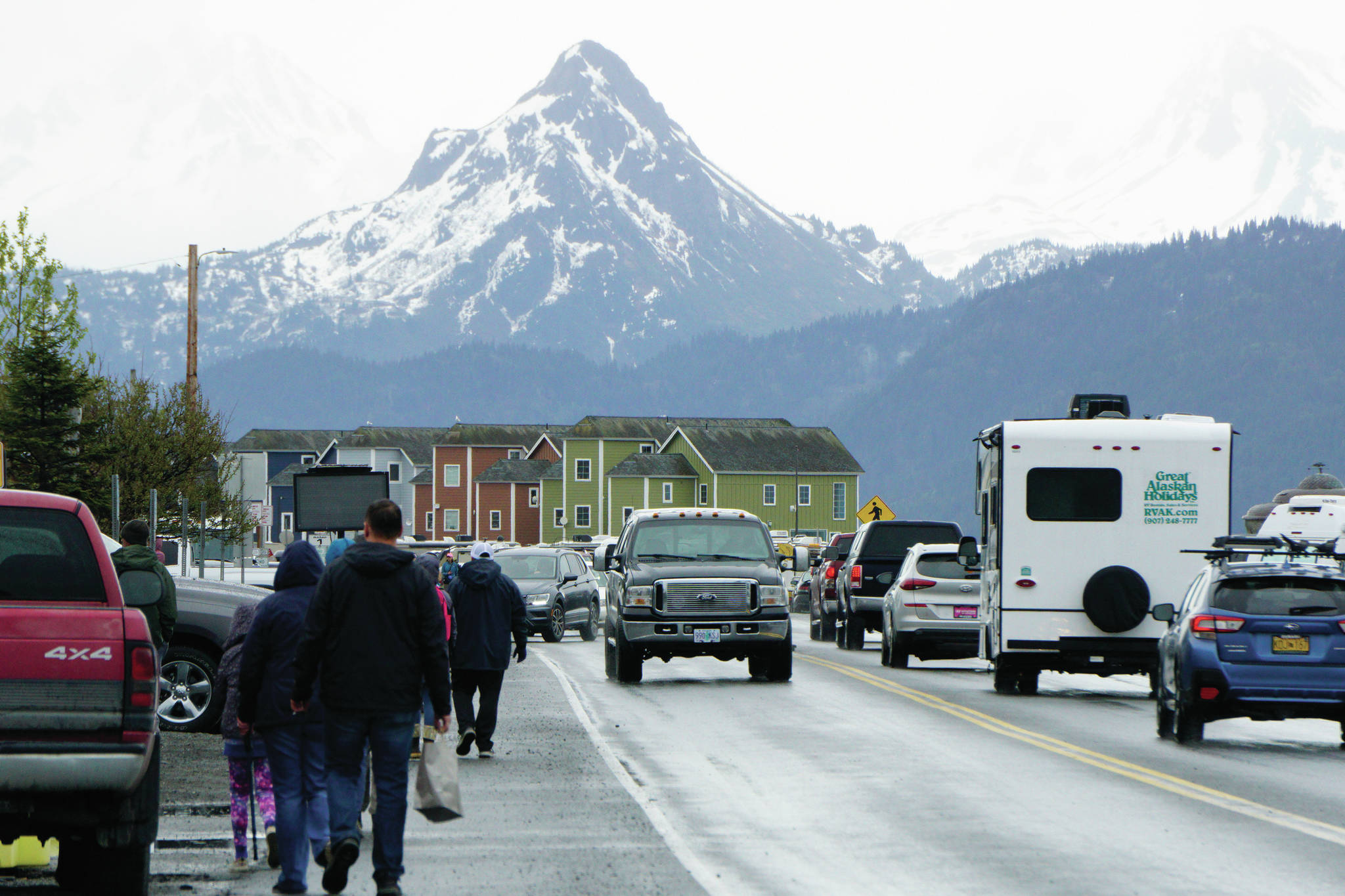 Poot Peak looms over visitors to the Homer Spit on Saturday, May 29, 2021, in Homer, Alaska. (Photo by Michael Armstrong/Homer News)