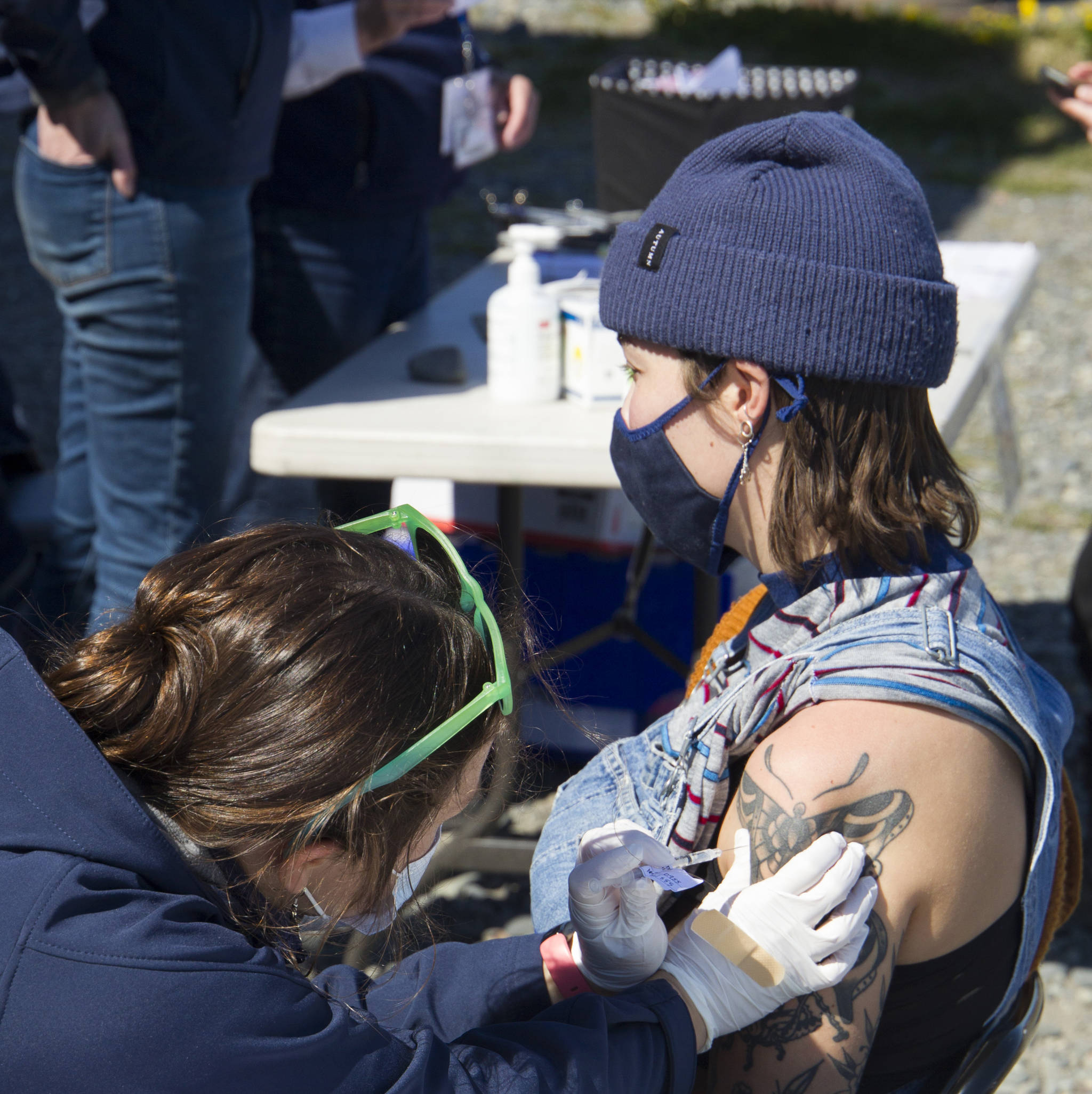 Grace Withers receives her second COVID-19 vaccine during the pop-up clinic on the Spit May 27. (Photo by Sarah Knapp/Homer News)