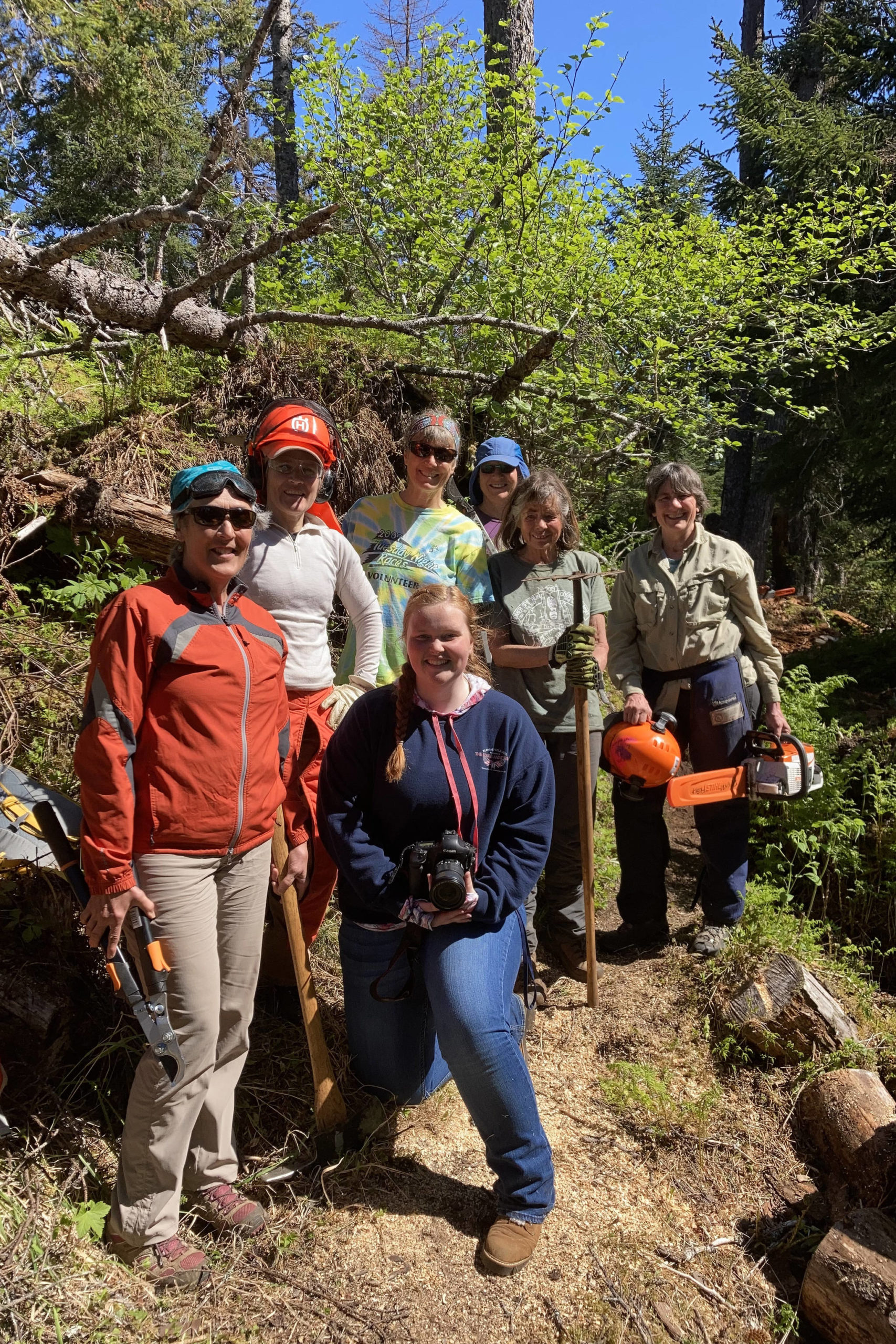 Homer News reporter Sarah Knapp (kneeling) is pictured with the Friends of Kachemak Bay State Park volunteer group who cleared South Eldred Trail during National Trails Day on June 5. The group was able to clear half a mile of the trail. Pictured left to right are Kristine Moerlein, Amy Holman, Kathy Sarns, Lyn Maslow, Ruth Dickerson and Kris Holderied. (Photo by Michael Singer)