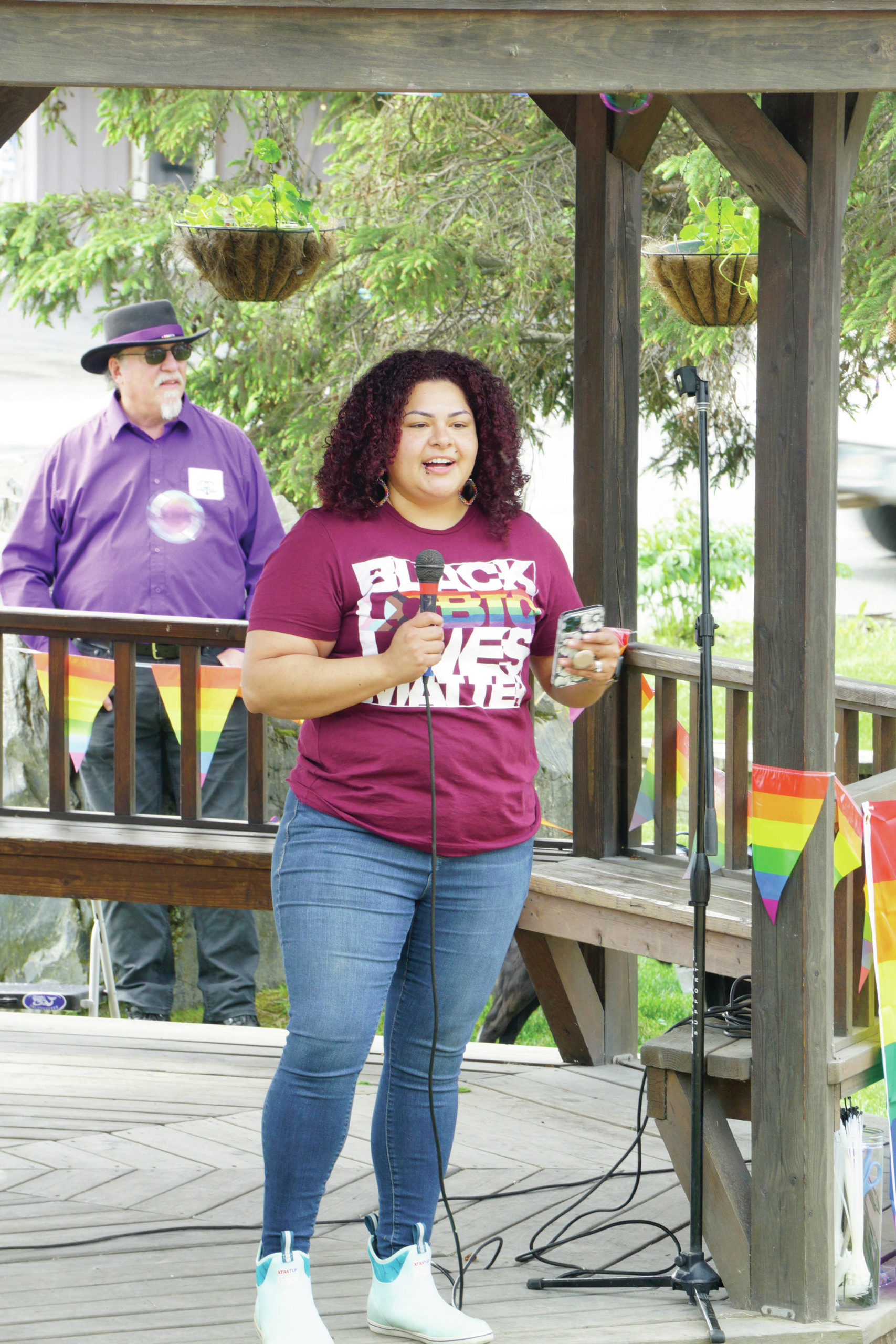 Xochitl Lopez-Ayala speaks on Saturday, June 19, 2021, at a combined Pride and Juneteenth event at Wisdom, Knowledge, Faith and Love Park in Homer, Alaska. (Photo by Michael Armstrong/Homer News)