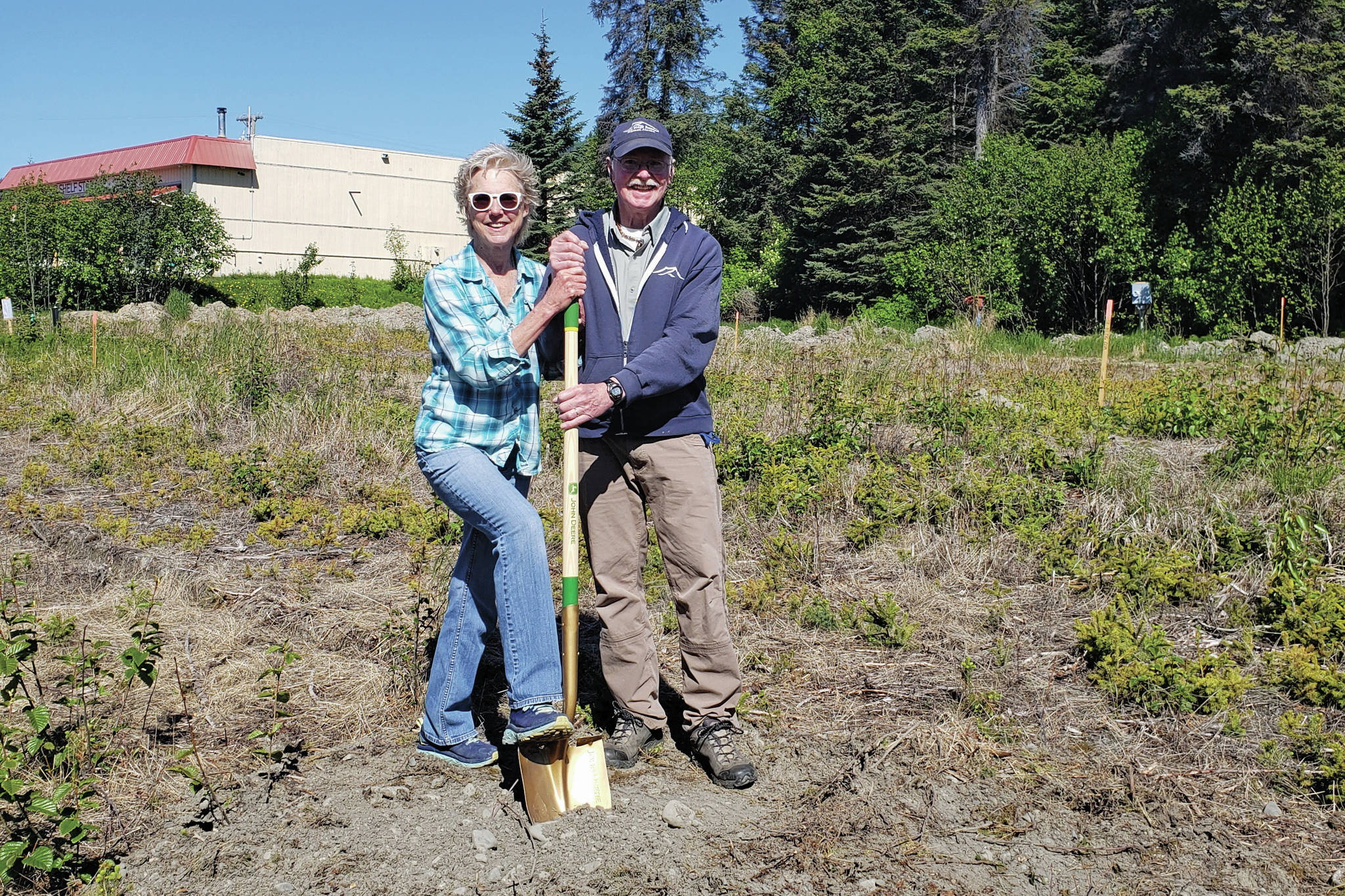 Sherry Stead, left, and Don Stead, right, pose on Sunday, June 6, 2021, at the groundbreaking of the new building for Grace Ridge Brewery at 870 Smoky Bay Way. Jay-Brant Contractors has started construction of the brewery, tasting room and beer garden to be completed by next fall. (Photo courtesy of Grace Ridge Brewery)