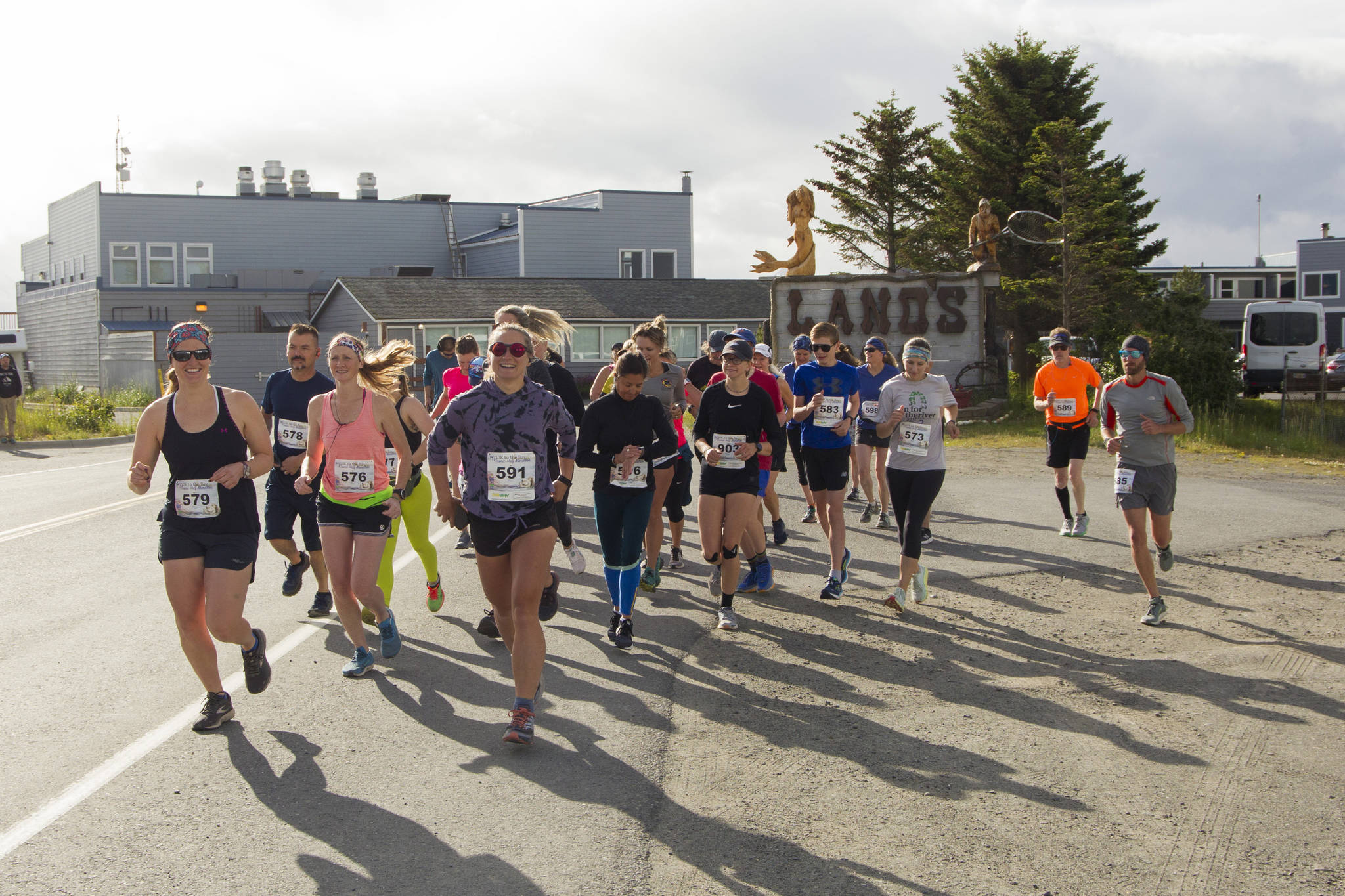 Participants of the Homer Spit Run half marathon begin the race at Land’s End. Thirty-two runners participated in the half marathon. (Photo by Sarah Knapp/Homer News)