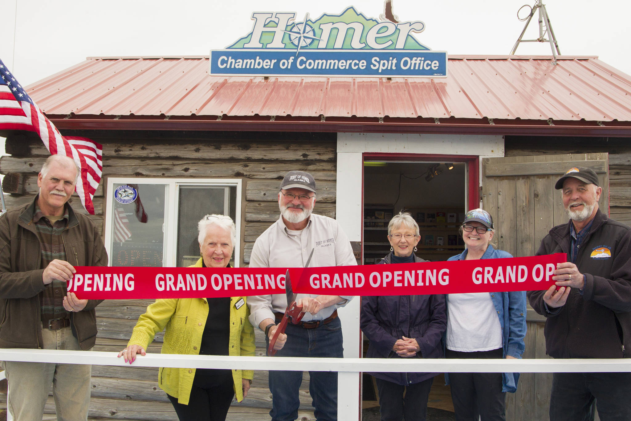 The Homer Chamber of Commerce and Visitor Center hosted a grand opening and ribbon-cutting ceremony for the new Homer Spit Visitor Information Center July 1. The office, located near Ramp 4 on the Homer Spit, will be open Thursdays through Sundays, July 1-Sept. 5 to offer information about Homer to visitors. (Photo by Sarah Knapp/Homer News)