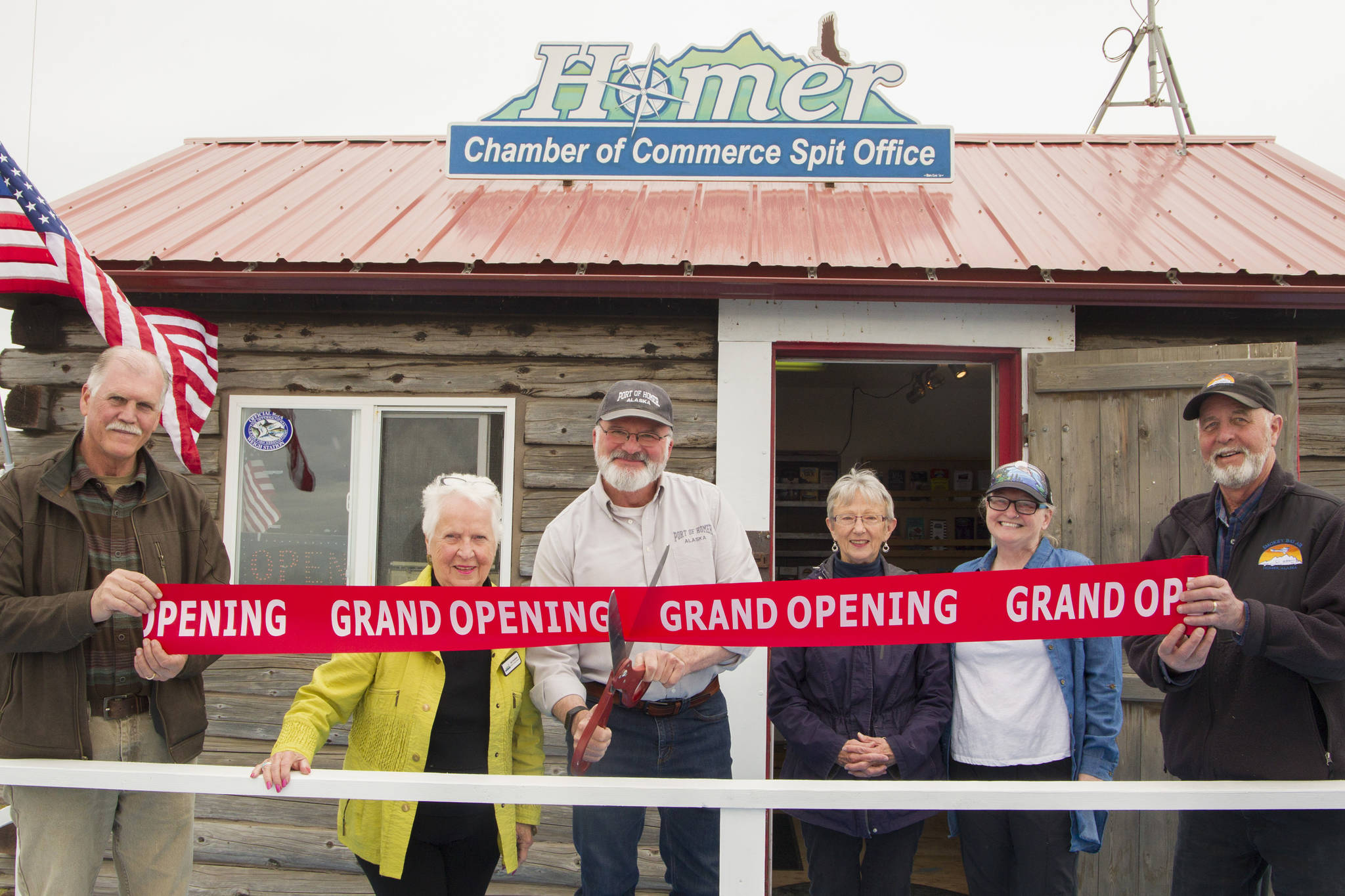 The Homer Chamber of Commerce and Visitor Center hosted a grand opening and ribbon-cutting ceremony for the new Homer Spit Visitor Information Center July 1. The office, located near Ramp 4 on the Homer Spit, will be open Thursdays through Sundays, July 1-Sept. 5 to offer information about Homer to visitors. (Photo by Sarah Knapp/Homer News)