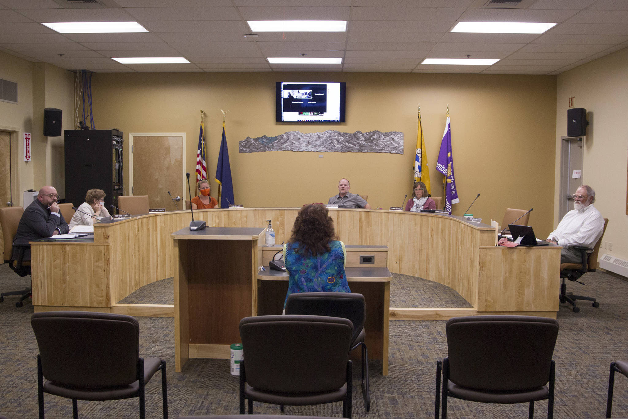 Jan Keiser, Homer Public Works director, testifies during the Homer City Council Committee of the Whole meeting on July 26 in the Cowles Council Chamber. (Photo by Sarah Knapp/Homer News)