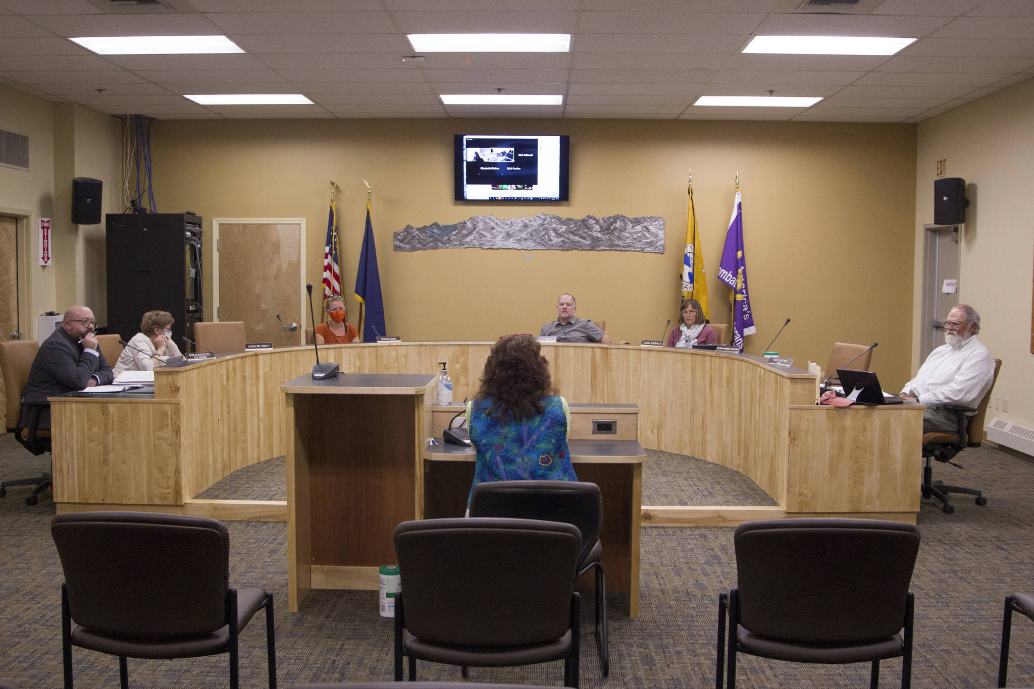 Jan Keiser, Homer Public Works director, testifies during the Homer City Council Committee of the Whole meeting on July 26 in the Cowles Council Chamber. (Photo by Sarah Knapp/Homer News)