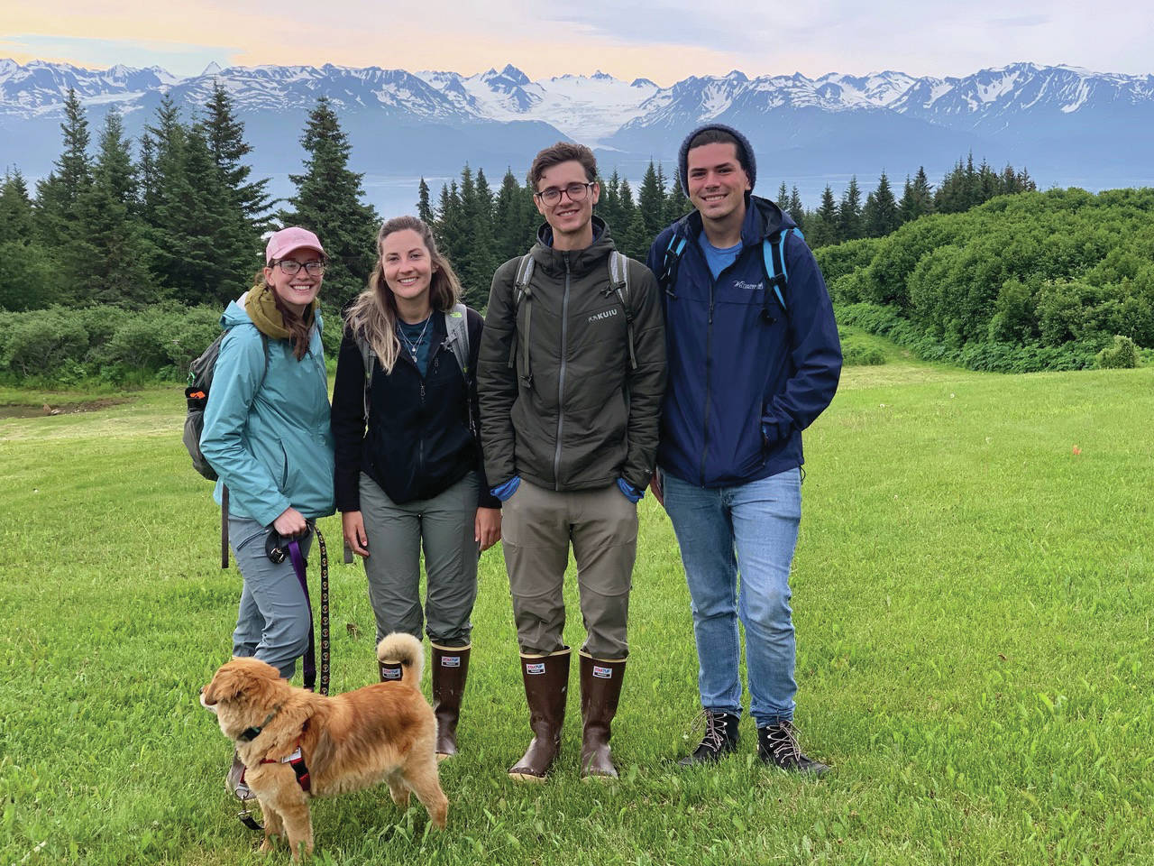 From left to right, Ashley Laukhuf, Kristin Armstrong, Nick Hansen and Kyle Barnes pose for a photo earlier this month on Inspiration Ridge Preserve near Homer, Alaska. The graduate students with the University of Michigan, Ann Arbor, were doing research with the School for Environment and Sustainability. (Photo by Nina Faust)