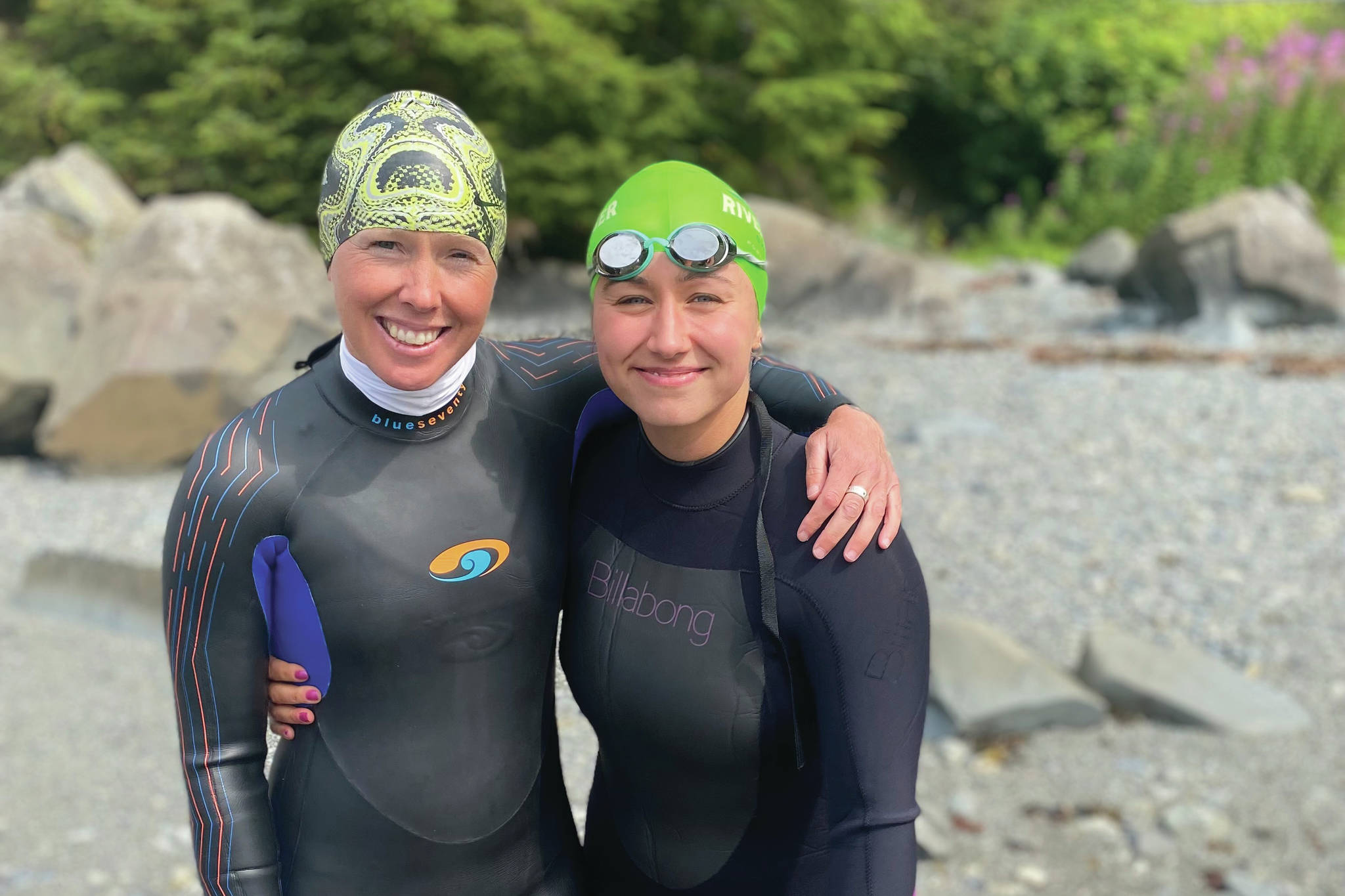 Photo by Cassidy Carroll 
Jessie Goodrich, left, and Lauren Kuhns, right, pose on Aug, 8, 2021, after swimming in the Change Your Latitude 10 km open ocean swim in Sitka. Goodrich is a Homer open ocean swimmer and Kuhns is a Homer woman attending Assumption College in Worchester, Massachusetts.