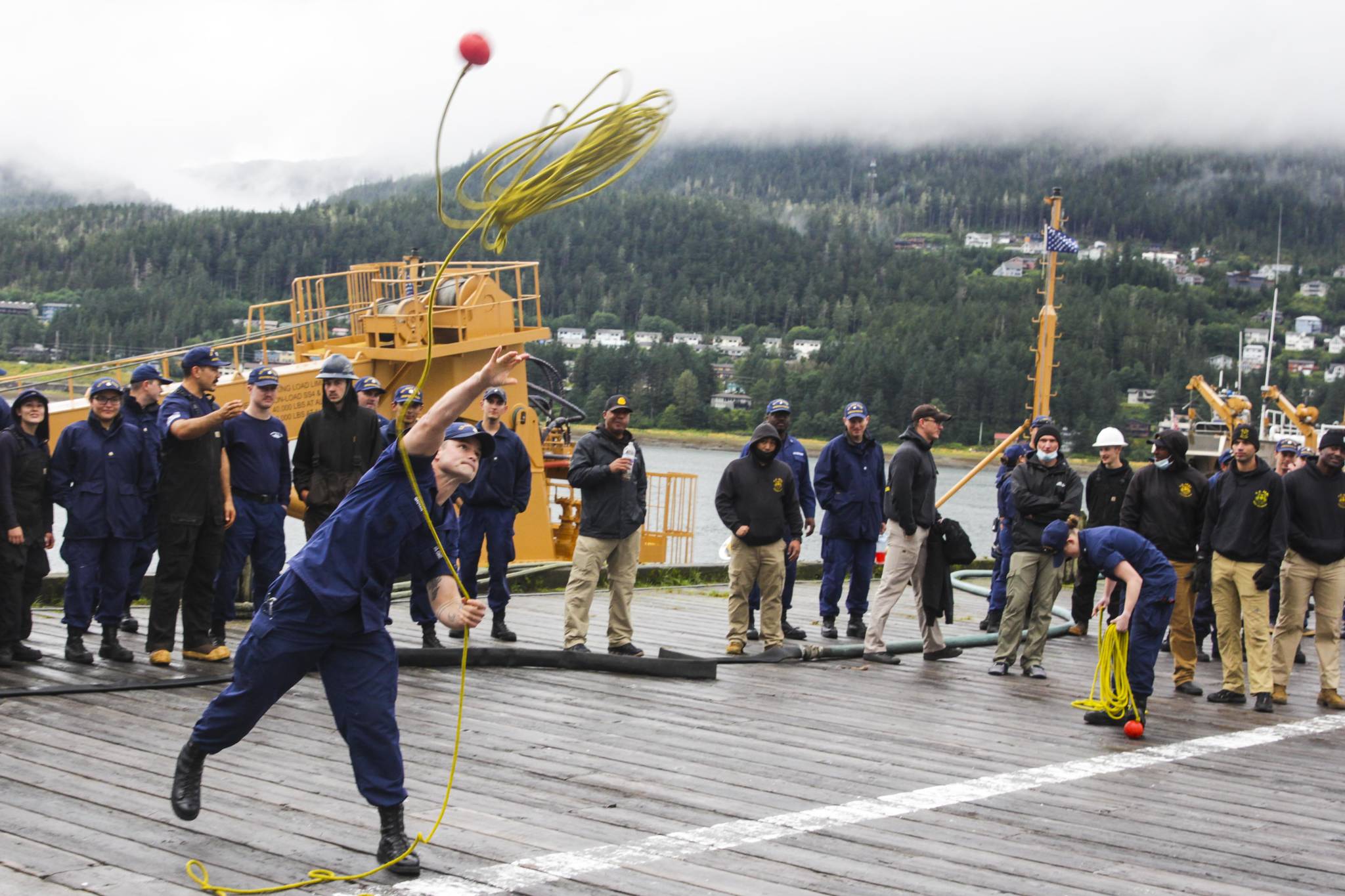 Petty Officer 1st Class Joseph Gauvain participates in the line toss, one of the inter-vessel competitions during this year’s Buoy Tender Roundup at Sector Juneau, on Wednesday, Aug. 25, 2021. (Michael S. Lockett / Juneau Empire)