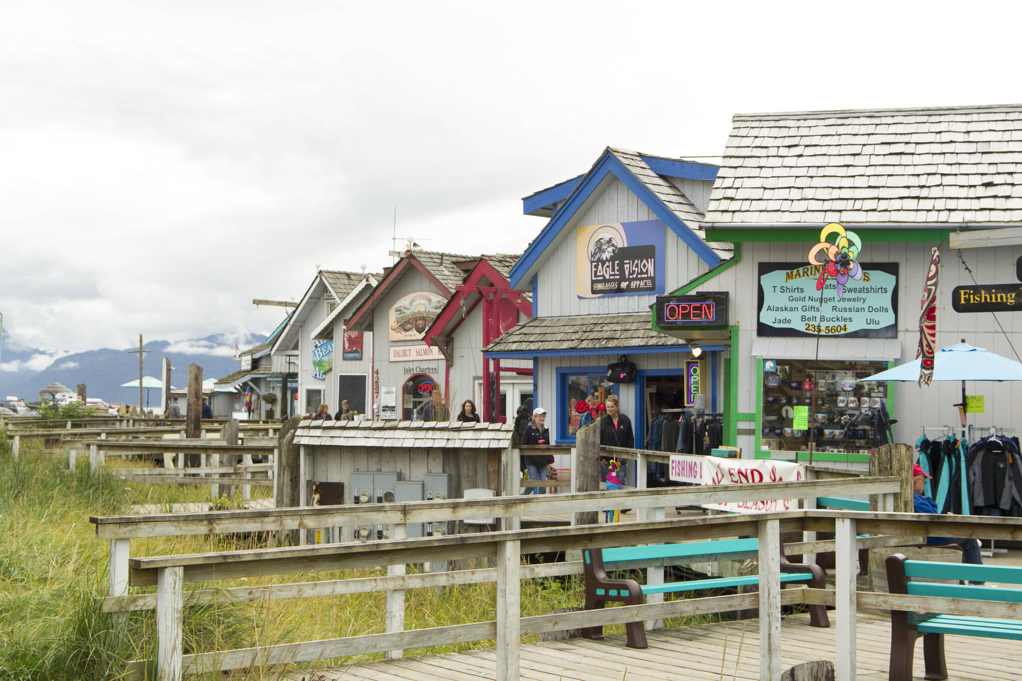 Visitors explore shops on the Homer Spit before the upcoming end of the season. (Photo by Sarah Knapp/Homer News)