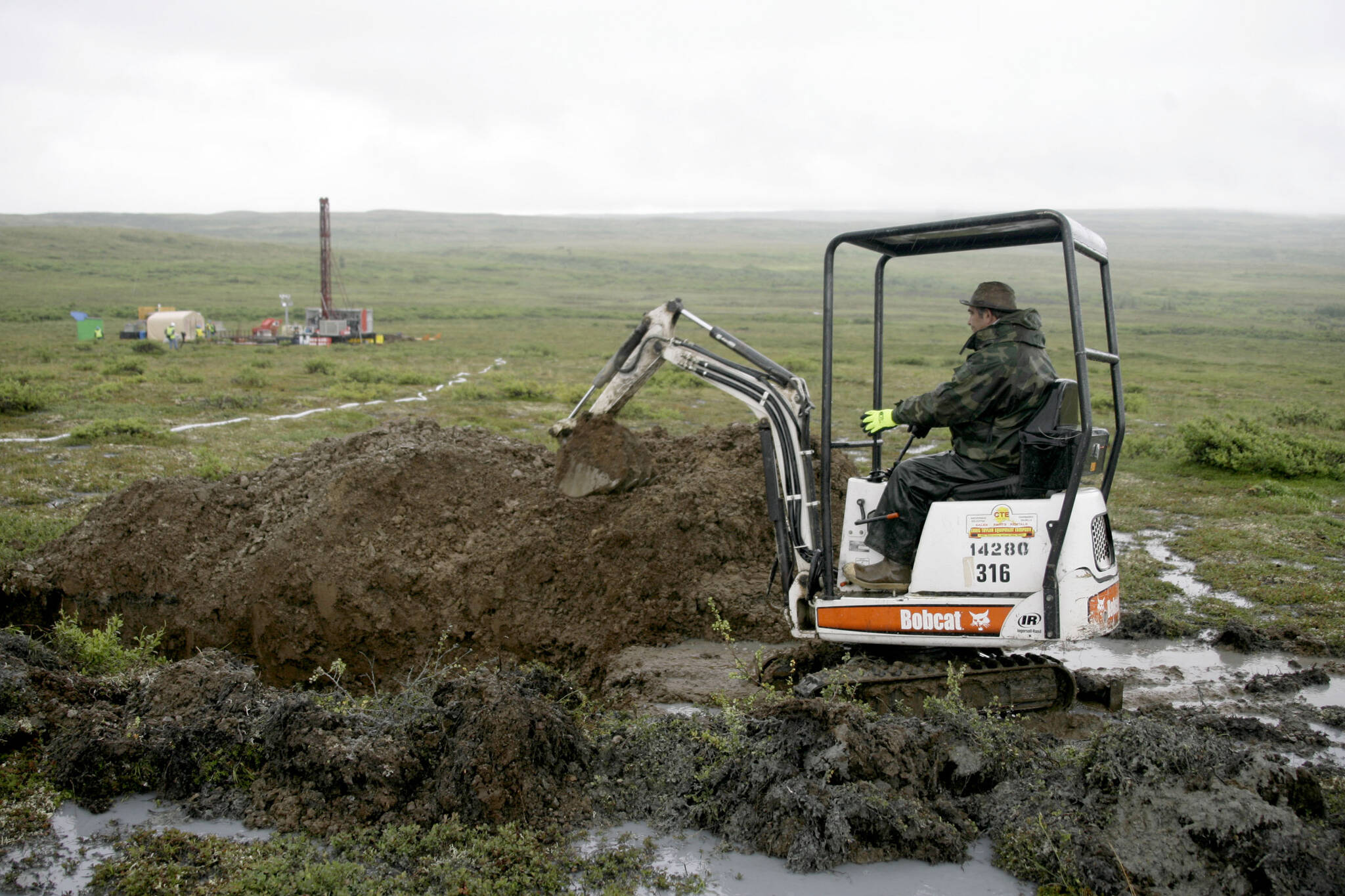 AP Photo / Al Grillo
A worker with the Pebble Mine project digs in the Bristol Bay region of Alaska near the village of Iliamma, Alaska. The U.S. Environmental Protection Agency announced Thursday, Sept. 9, 2021, it would seek to restart a process that could restrict mining in Alaska’s Bristol Bay region, which is renowned for its salmon runs. The announcement is the latest in a long-running dispute over a proposed copper-and-gold mine in the southwest Alaska region.