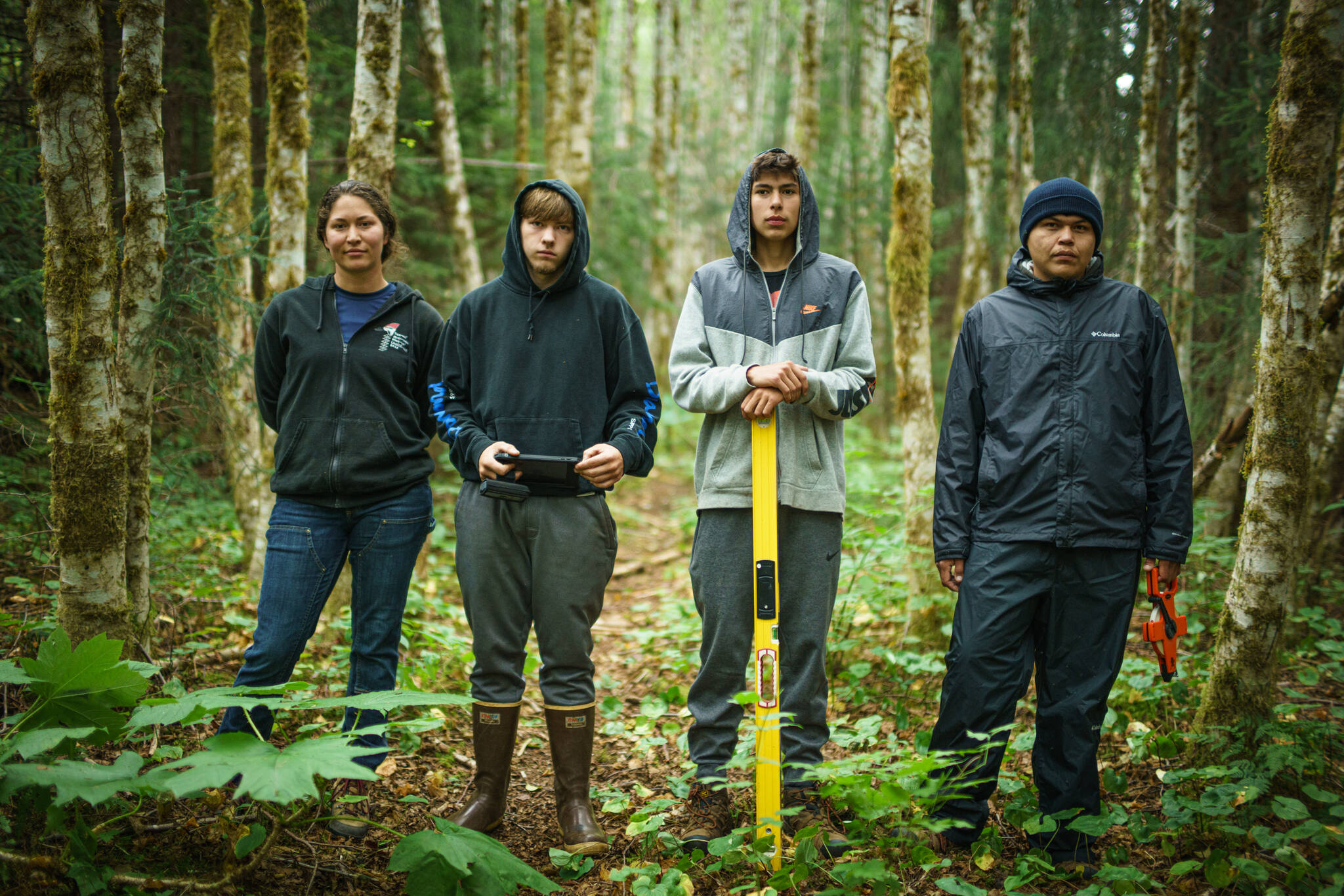 From left to right:Miakah Nix, Daniel Ashenfelter, Shawn Merry and Conrad Revey, members of the Keex' Kwaan Community Forest Partnership, one of the many existing programs set to benefit from the trust. The Keex'Kwaan Community Forest Partnership and the Hoonah Native Forest Partnership are collaborative land management programs and are helping to define what community land management can look like for Southeast Alaska. These partnerships help develop a local workforce for natural resource careers including through the Alaska Youth Stewards program which targets high school-aged Alaskans. Programs work with private, state, and federal land managers to ensure that local priorities, local employment, and Indigenous values are integrated into the treatment of local lands and waters. (Courtesy photo / Bethany Goodrich)