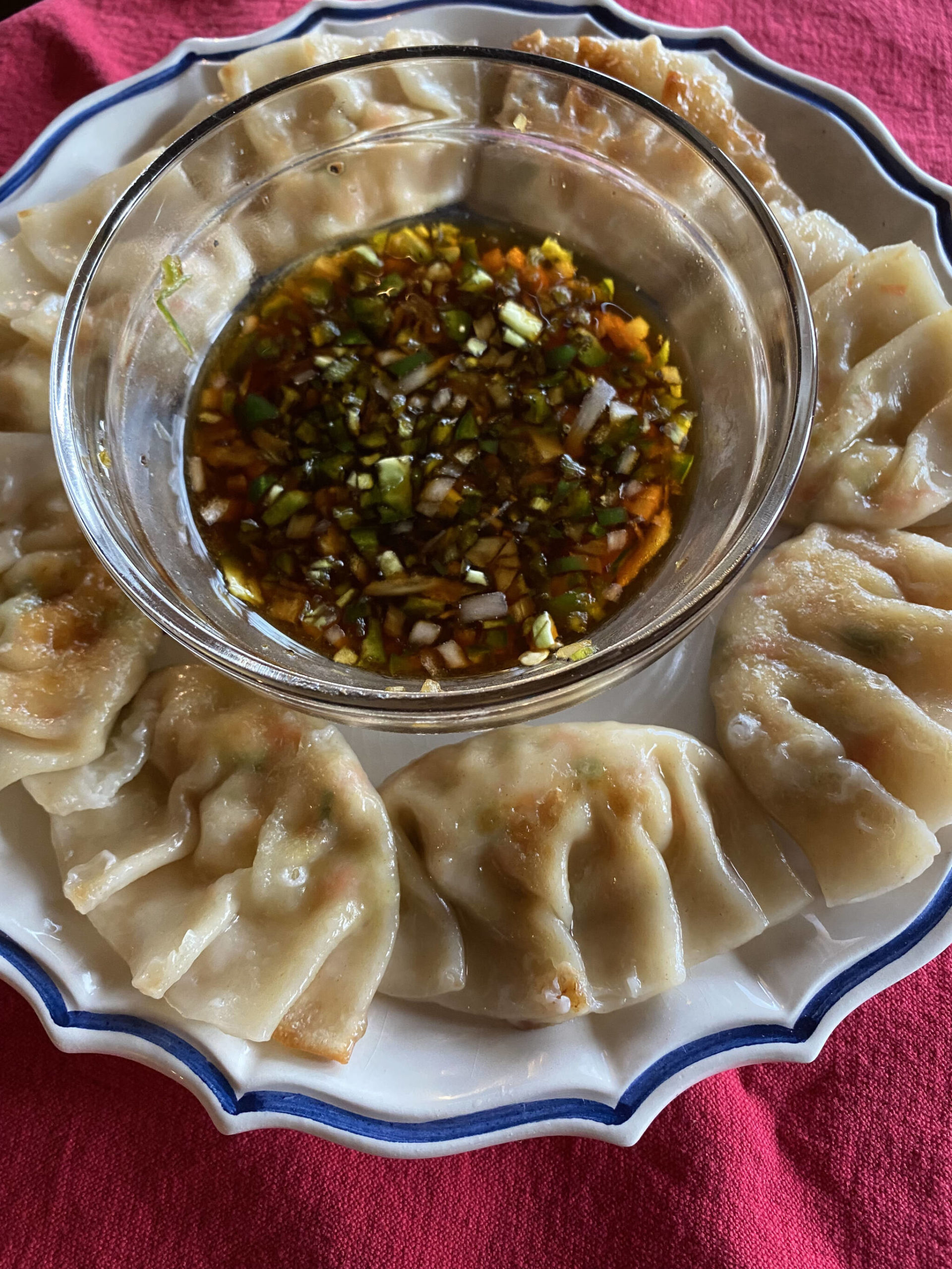 Cooked by a combination of pan frying and steaming, delicate tofu and vegetable dumplings require a delicate hand and patience. (Photo by Tressa Dale/Peninsula Clarion)