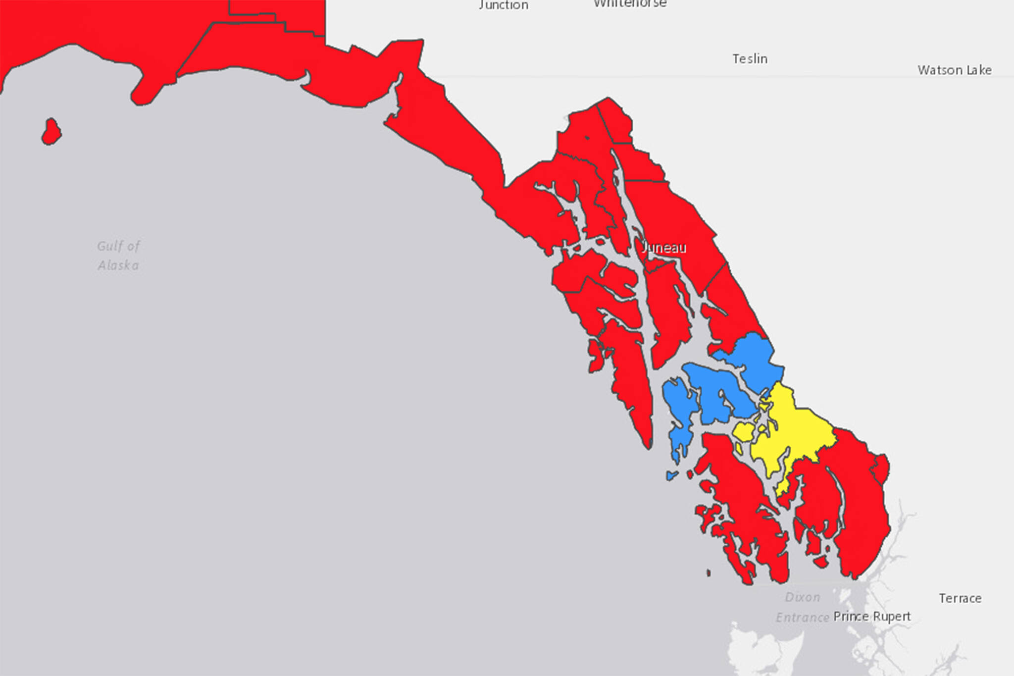 This screenshot of the Department of Health and Social Services COVID-19 cases dashboard shows the alert level in communities in Southeast Alaska. Red areas are at a high alert level and based on more than 100 cases per 100,000 people over a seven-day period. Yellow areas are at a moderate risk level based on 10-50 cases per 100,000 people over a week. Blue areas are at a low level based on 10 or fewer cases per 100,000. (Screenshot)