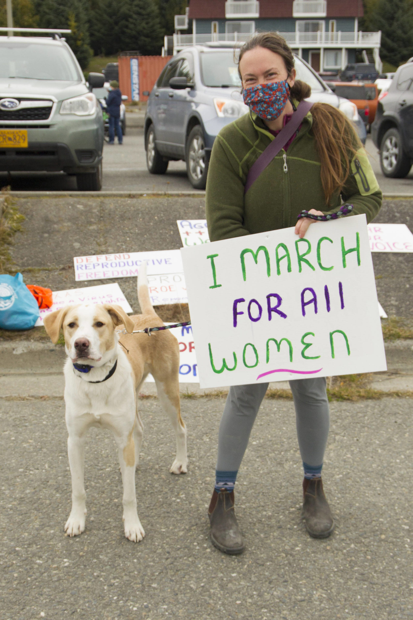 Liz Mering and her dog Pancake participated in Saturday’s women’s rights march. (Photo by Sarah Knapp/Homer News)