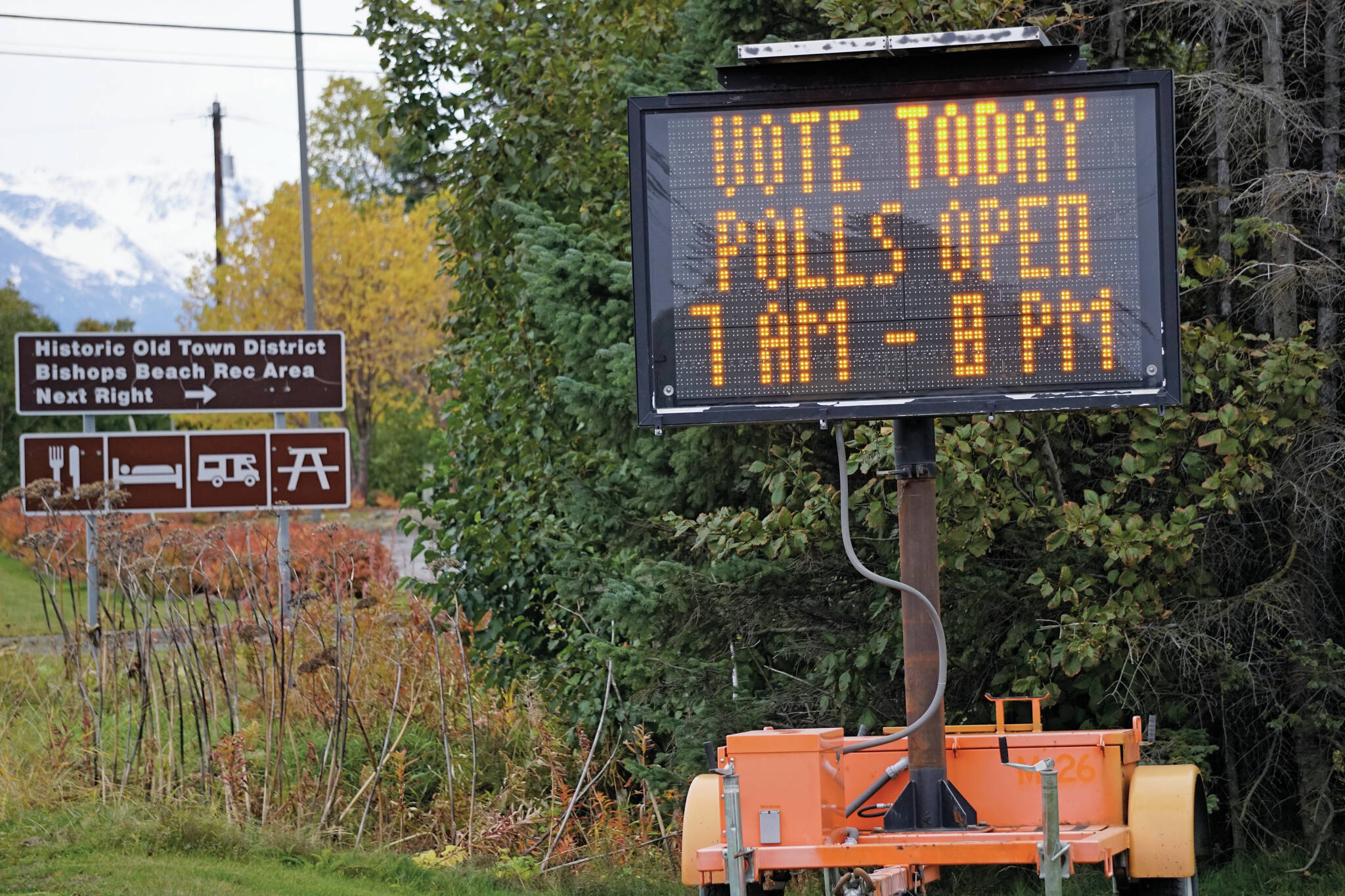 An electronic sign o the Sterling Highway reminds people to vote on Tuesday, Oct. 2, 2021, in Homer, Alaska. (Photo by Michael Armstrong/Homer News)