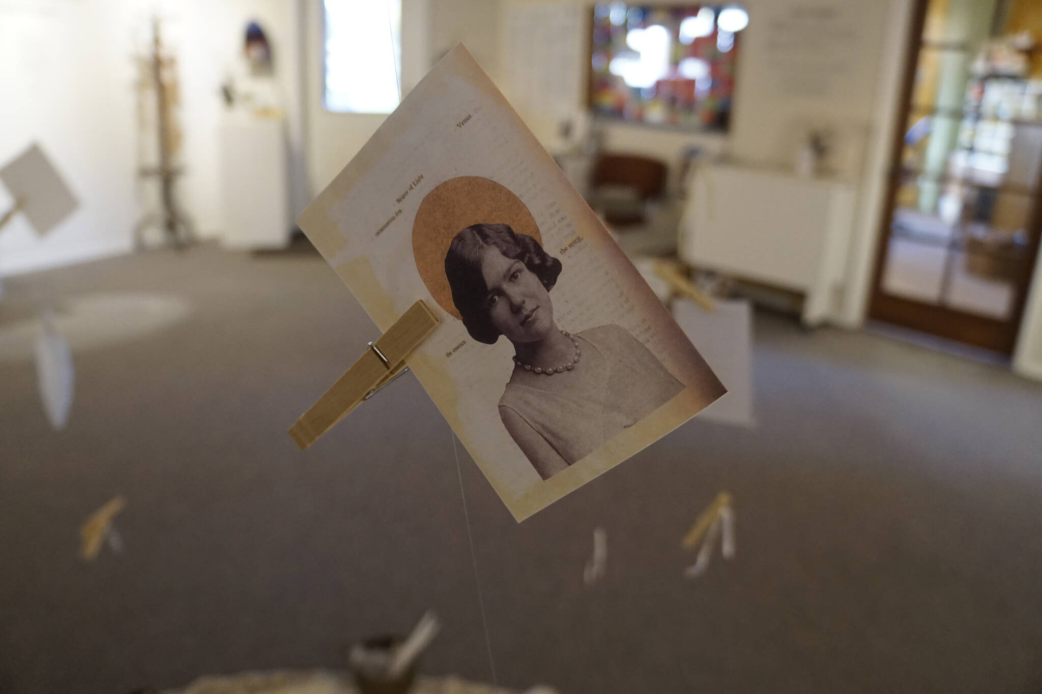 For Carly Garay’s “The Art of Ancestor Veneration,” vistors are invited to include images, letters or prayers honoring ancestors at a central dispaly. The exhibit shows through Oct. 30, 2021, at the Homer Council on the Arts in Homer, Alaska. (Photo by Michael Armstrong/Homer News)