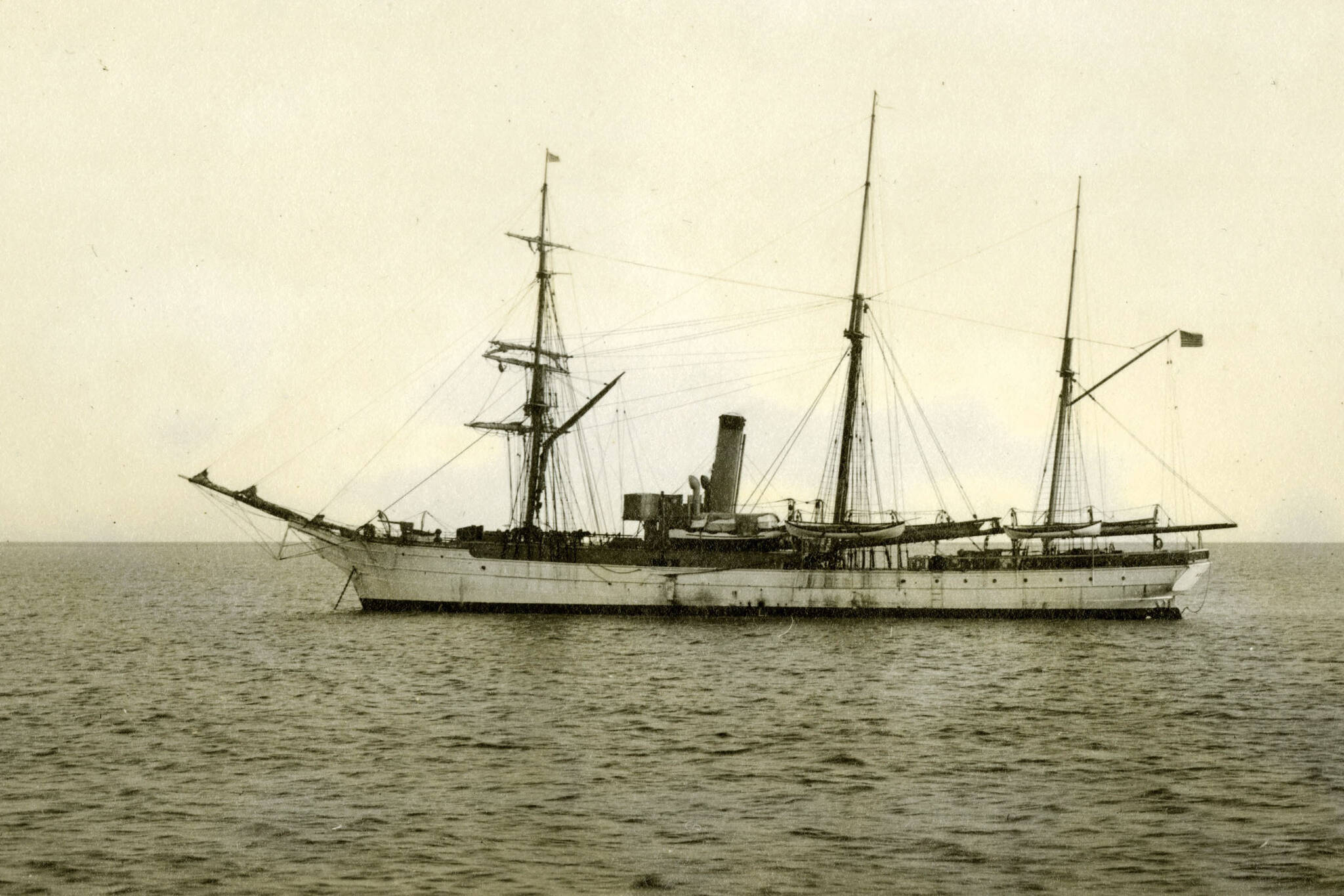 In this July 1908 photograph provided by the U.S. Coast Guard Historian’s Office, the U.S. Revenue Cutter Bear sits at anchor while on Bering Sea Patrol off Alaska. The wreckage of the storied vessel, that served in two World Wars and patrolled frigid Arctic waters for decades, has been found, the Coast Guard said Tuesday, Oct. 12, 2021. (U.S. Coast Guard Historian’s Office via AP)