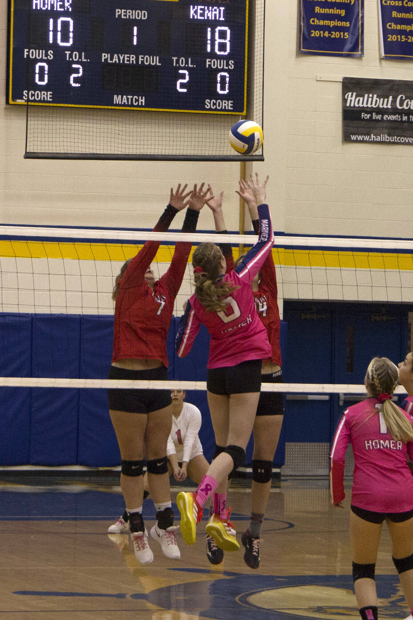 Homer High School senior Olivia Lafleur hits the ball over the net. (Photo by Sarah Knapp/Homer News)