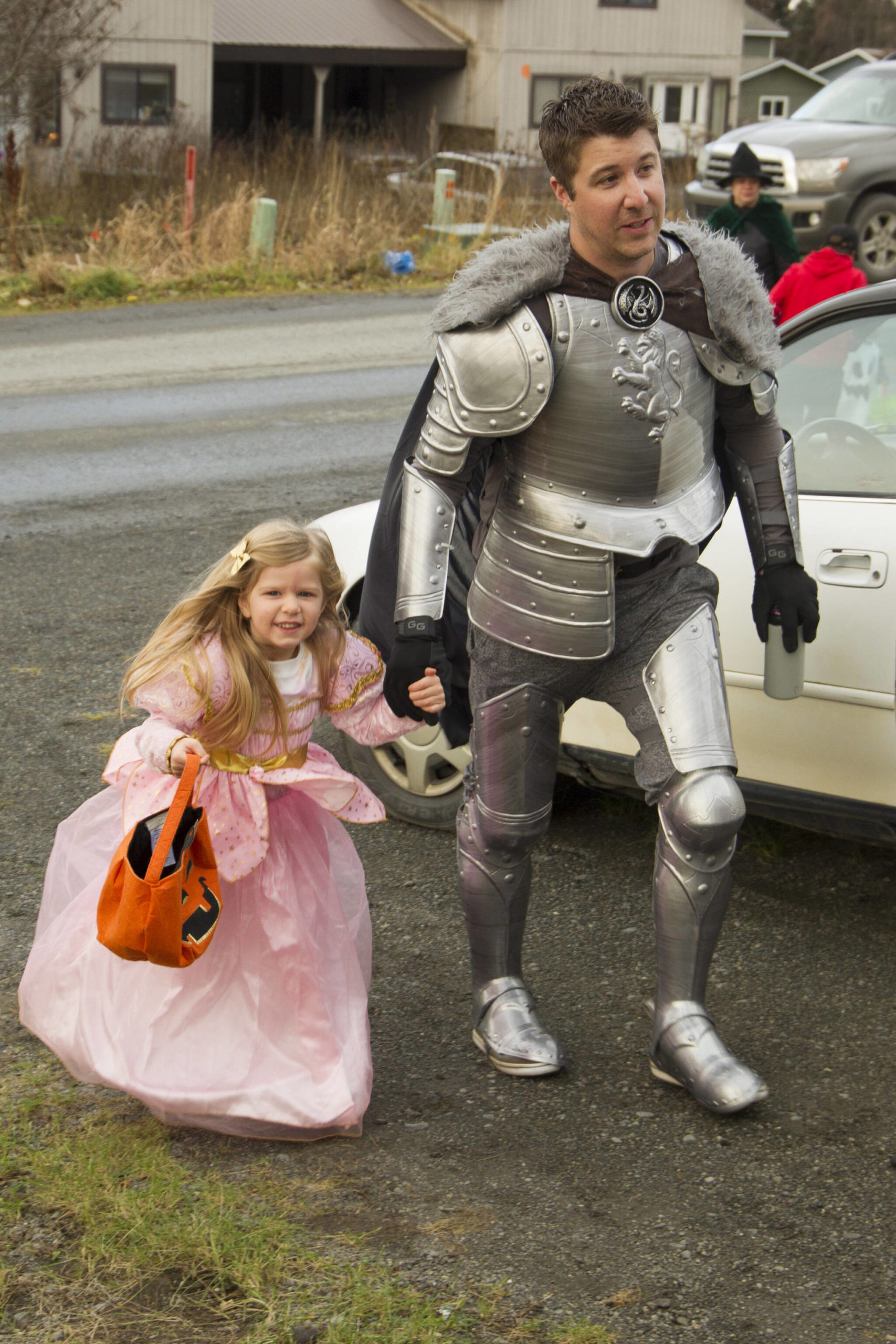 A princess and her knight in shining armor trick-or-treat on Bayview Avenue on Sunday, Oct. 31. (Photo by Sarah Knapp/Homer News)